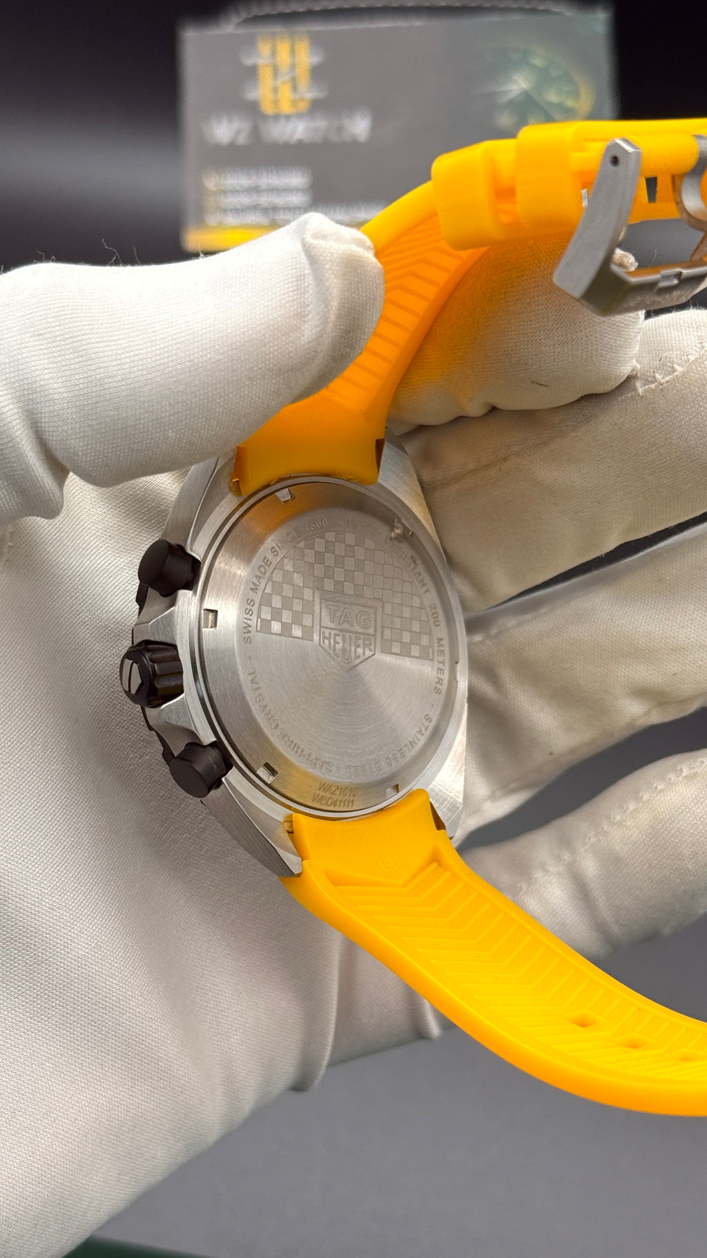 Silver with yellow Dial.