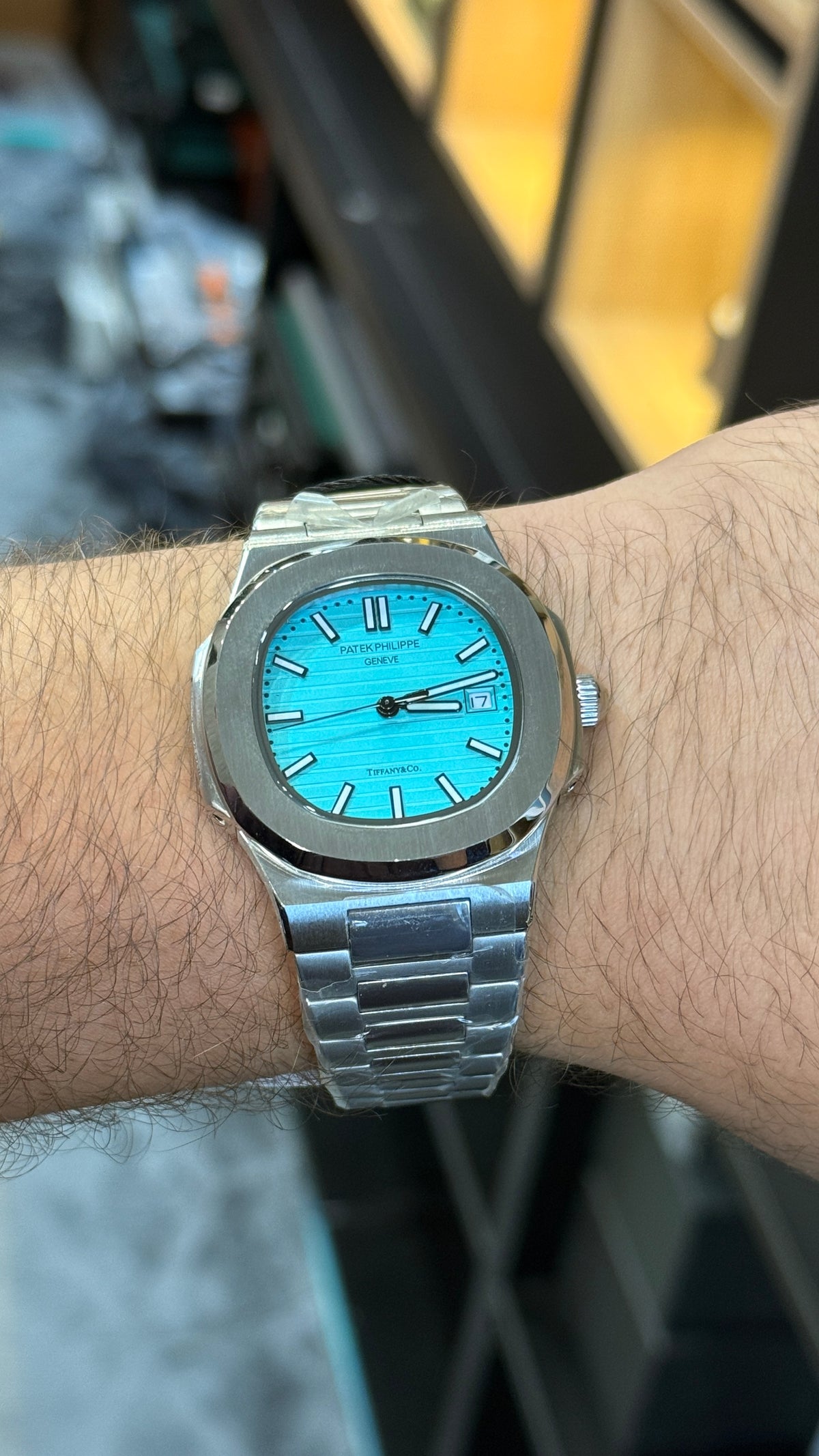 Silver with tiffany Dial.