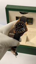Rose gold with black Dial