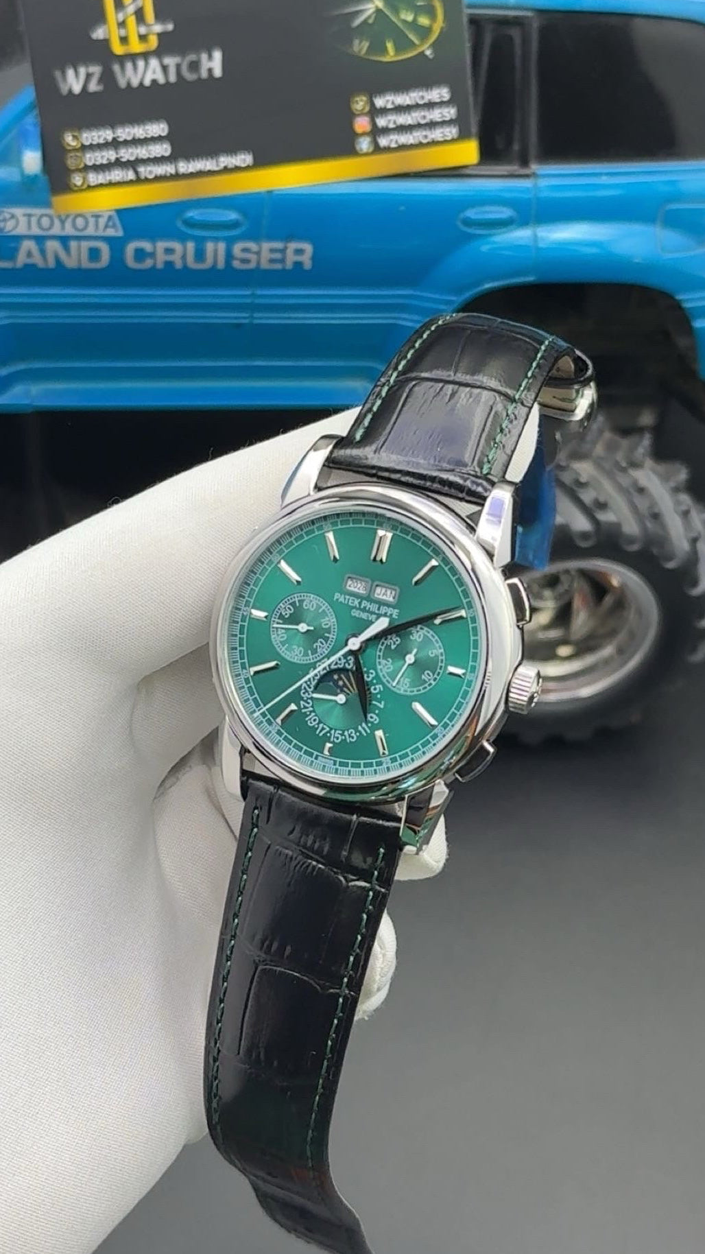 Silver with green Dial.