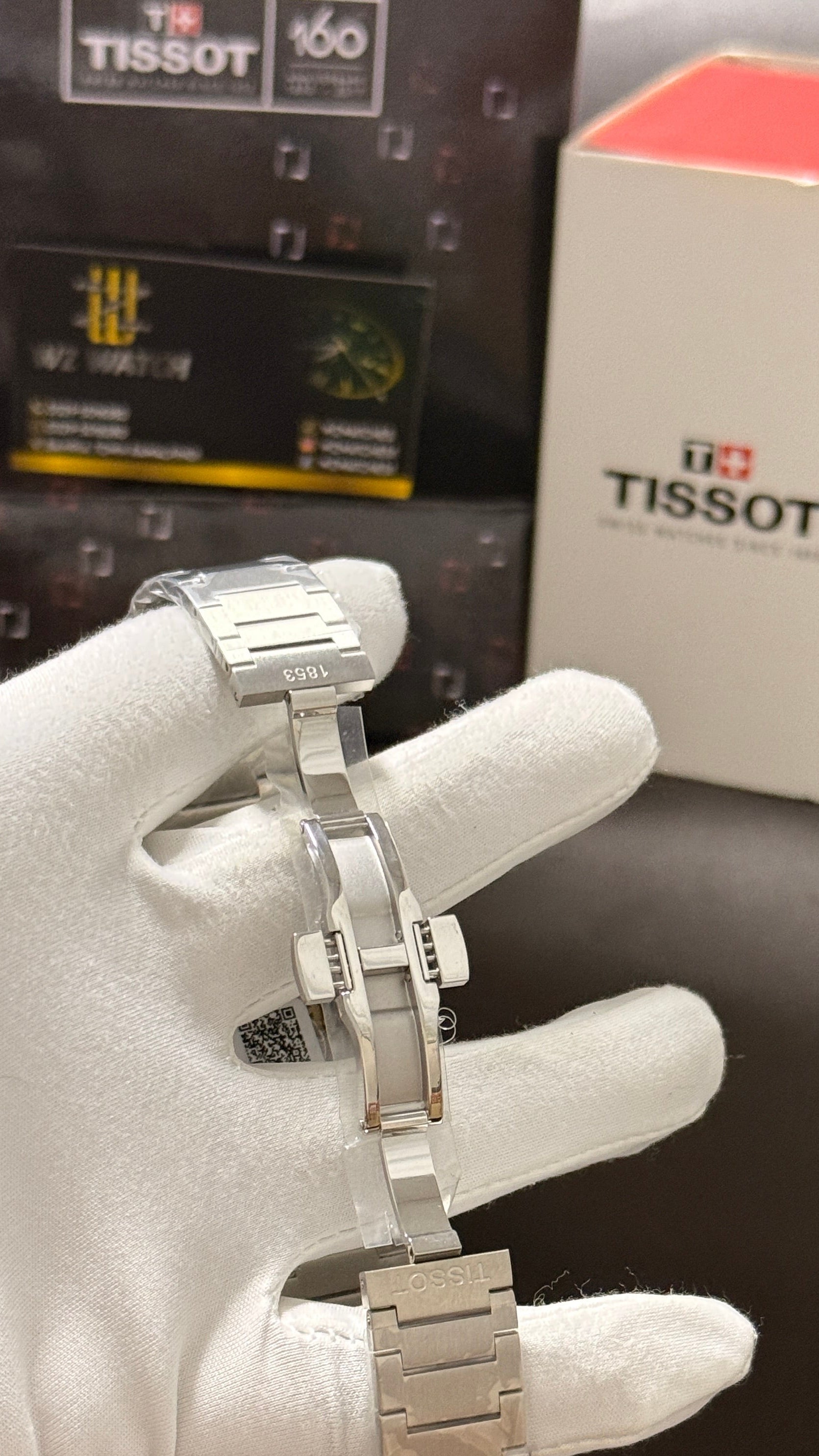 Silver with green dial