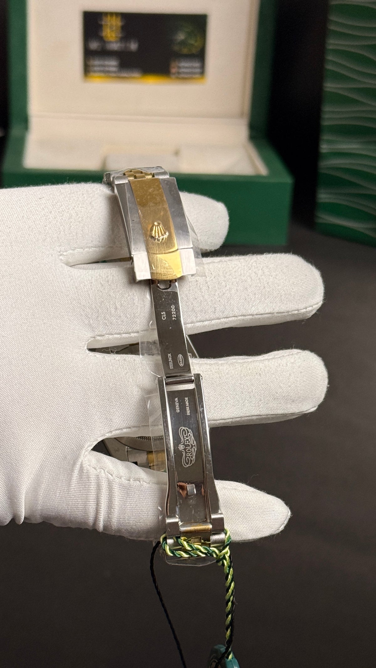 Yellow gold tow tone with grey Dial.