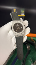Silver with black Dial.