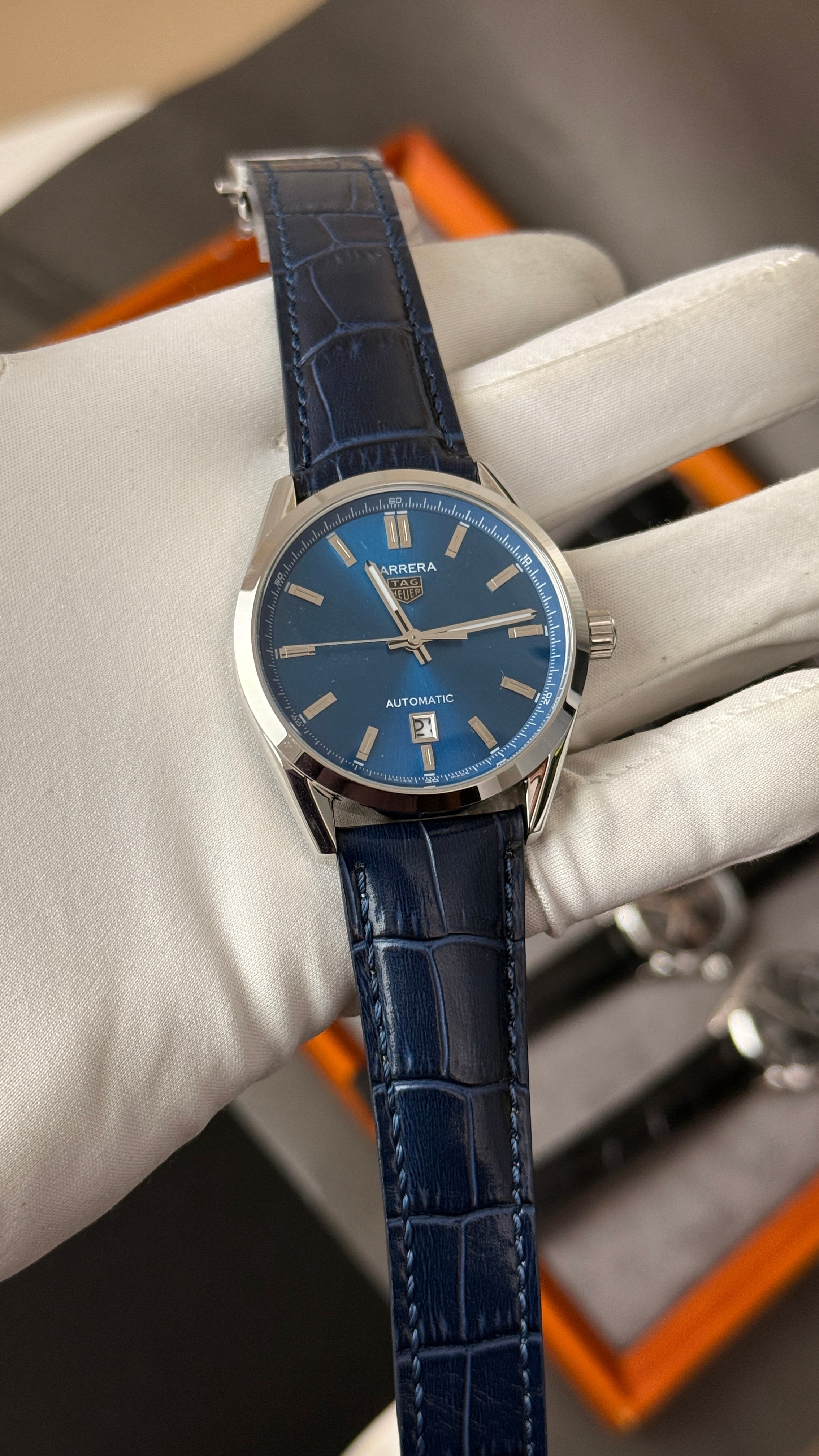 Silver with blue Dial