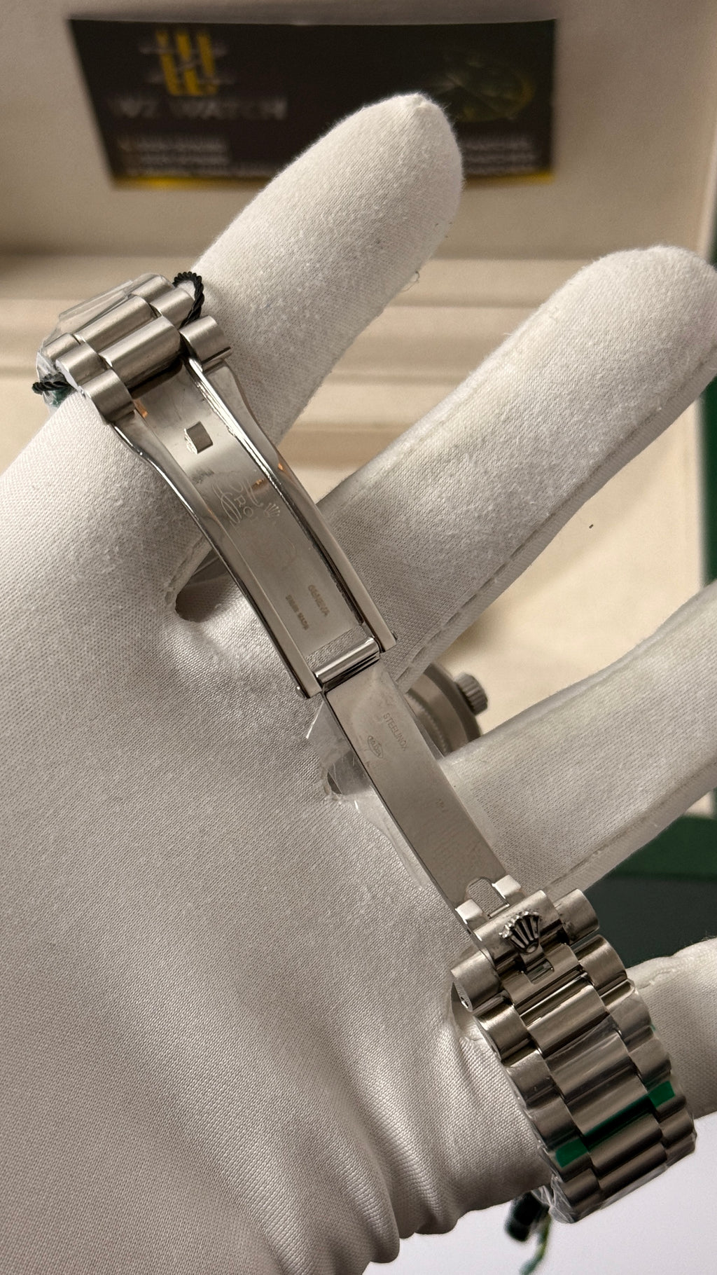 Silver with  green Dial.
