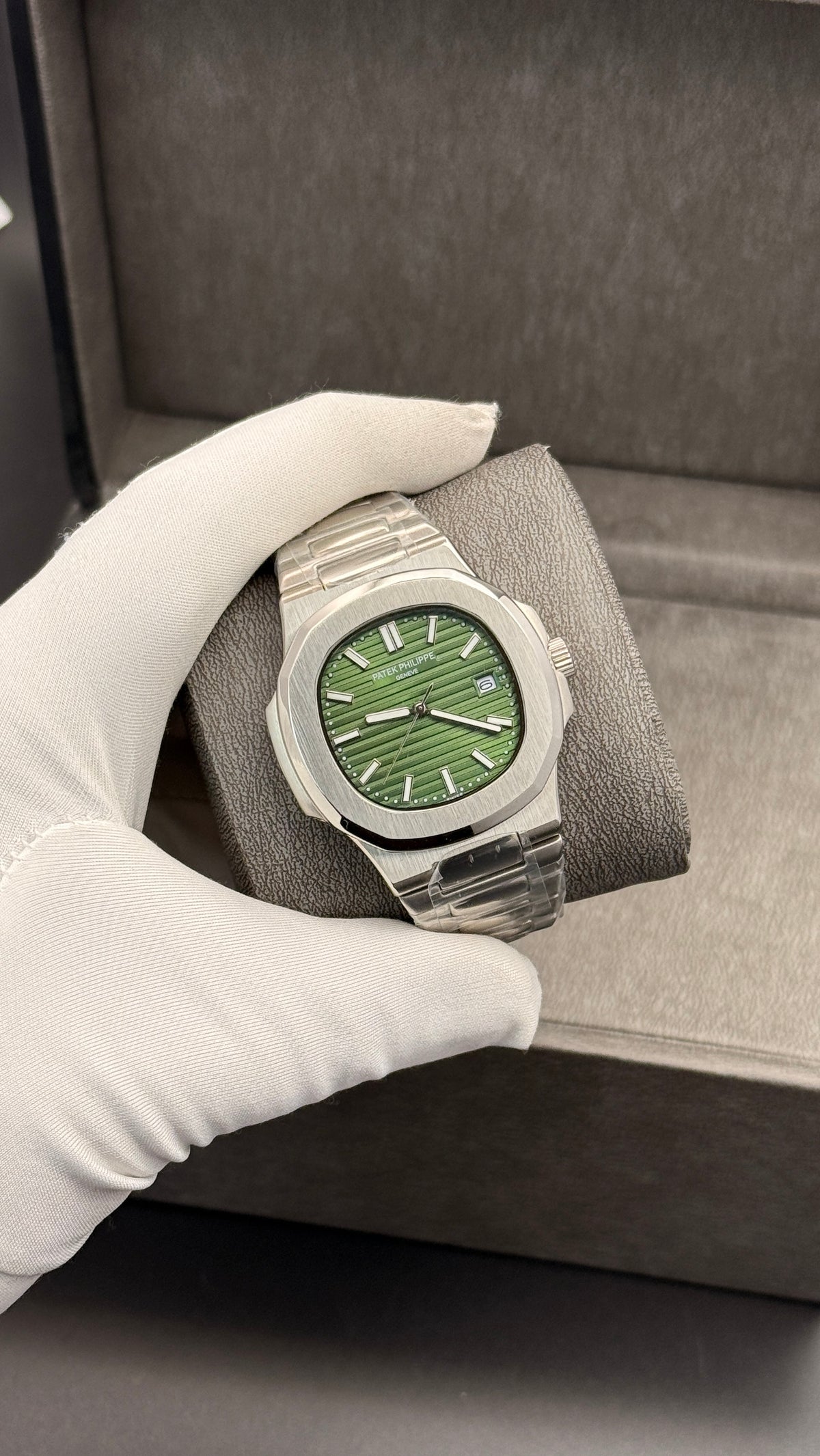 Silver with green Dial.