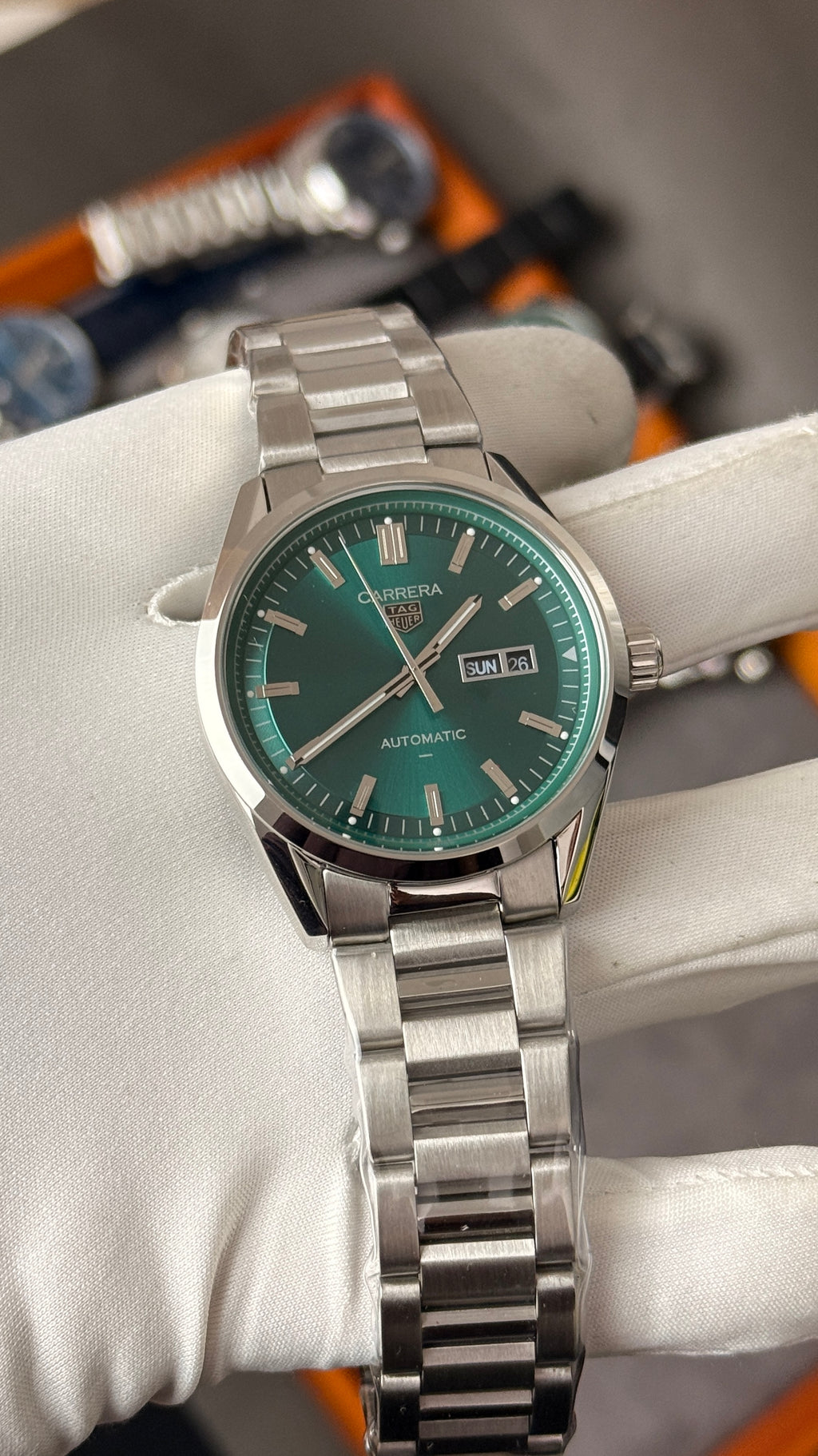 Silver with  green Dial