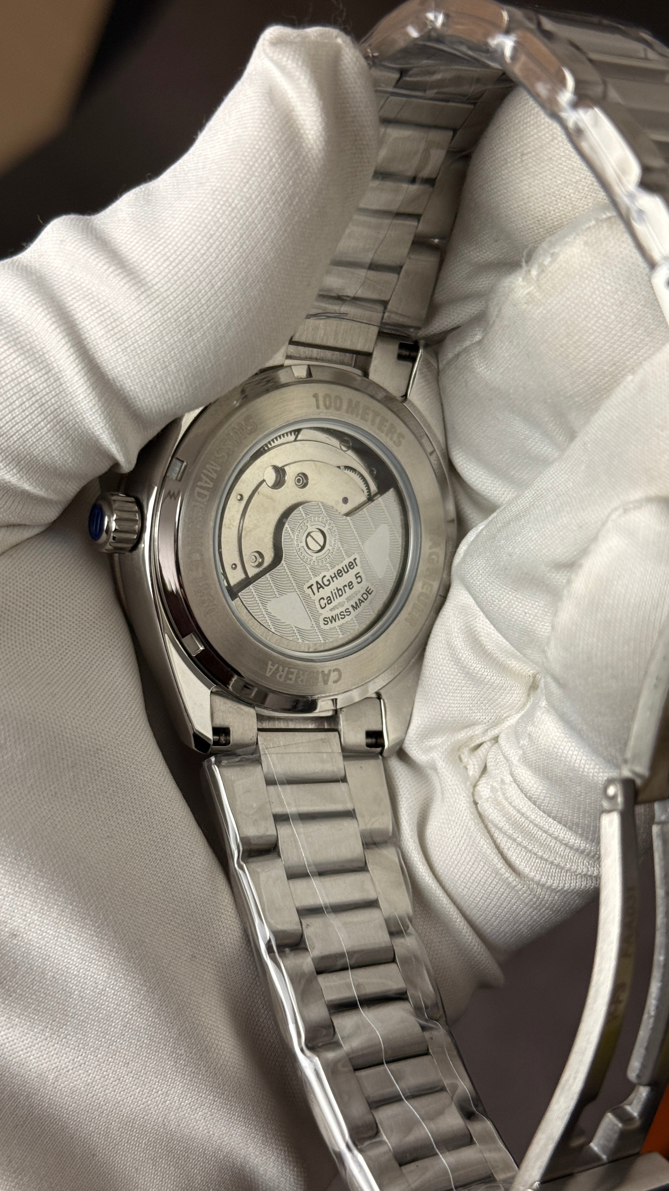 Silver with  green Dial