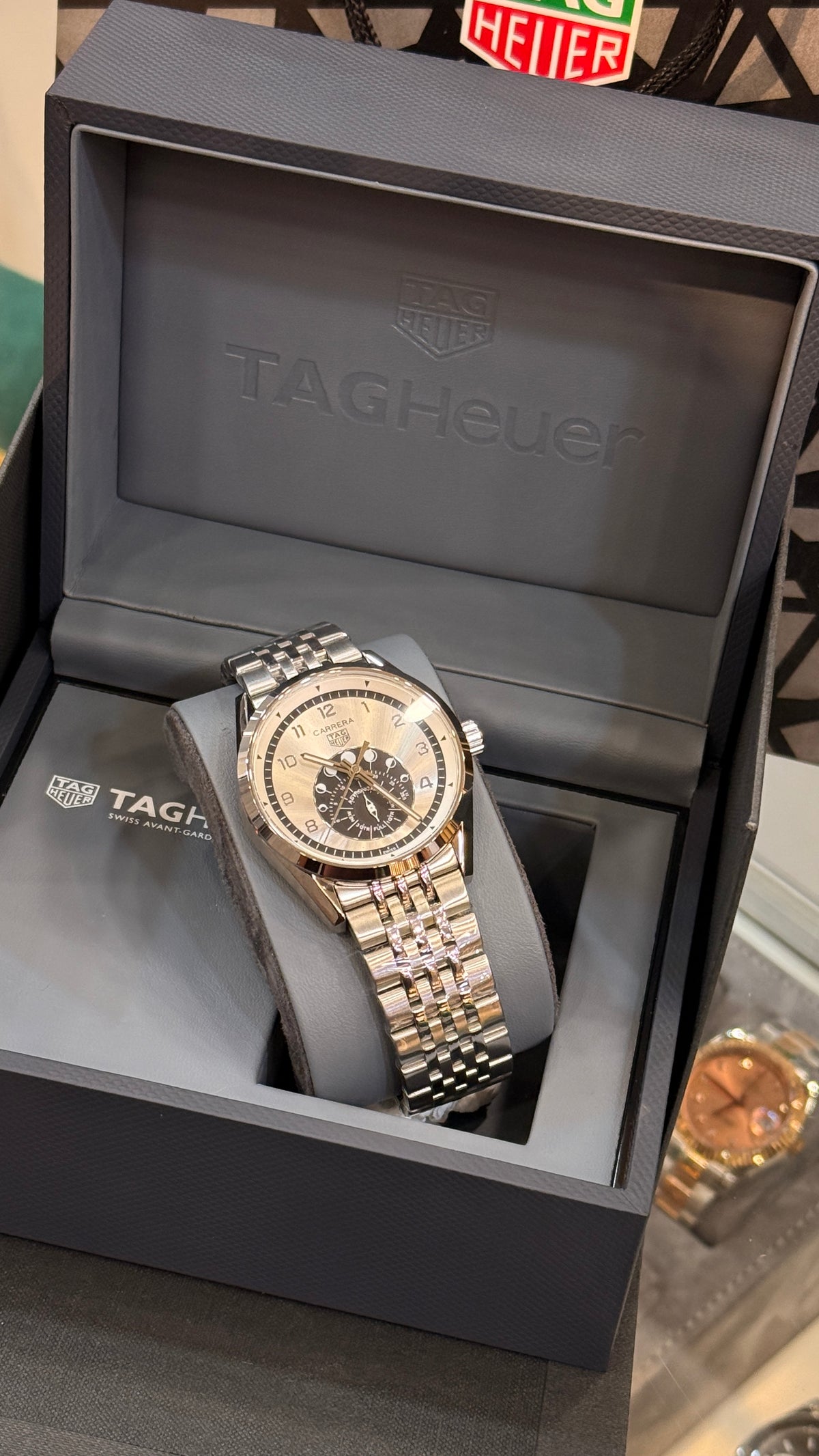 Silver with white Dial.