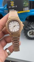 Rose gold  with white Dial.