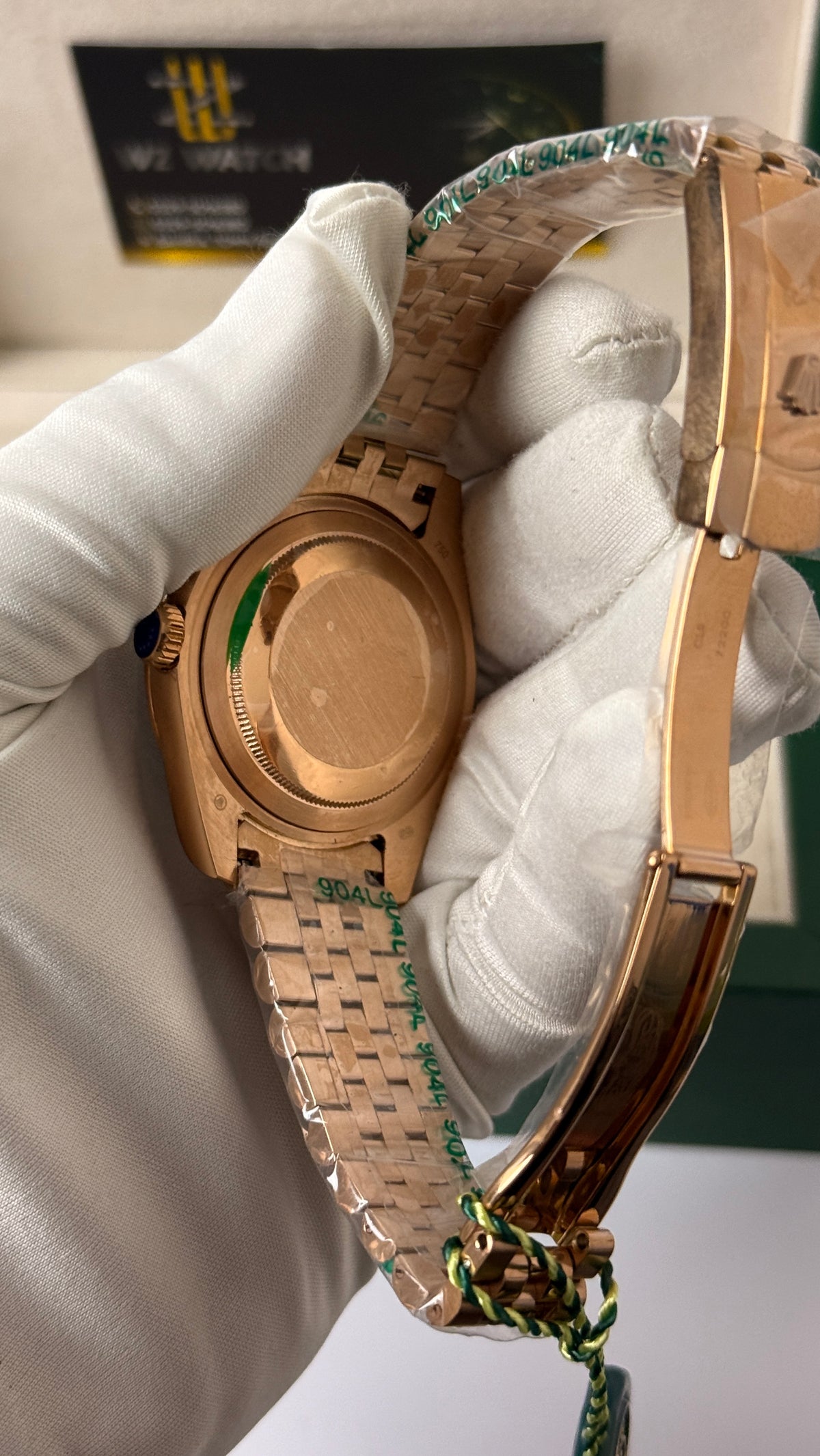 Rose gold with aqua Dial.