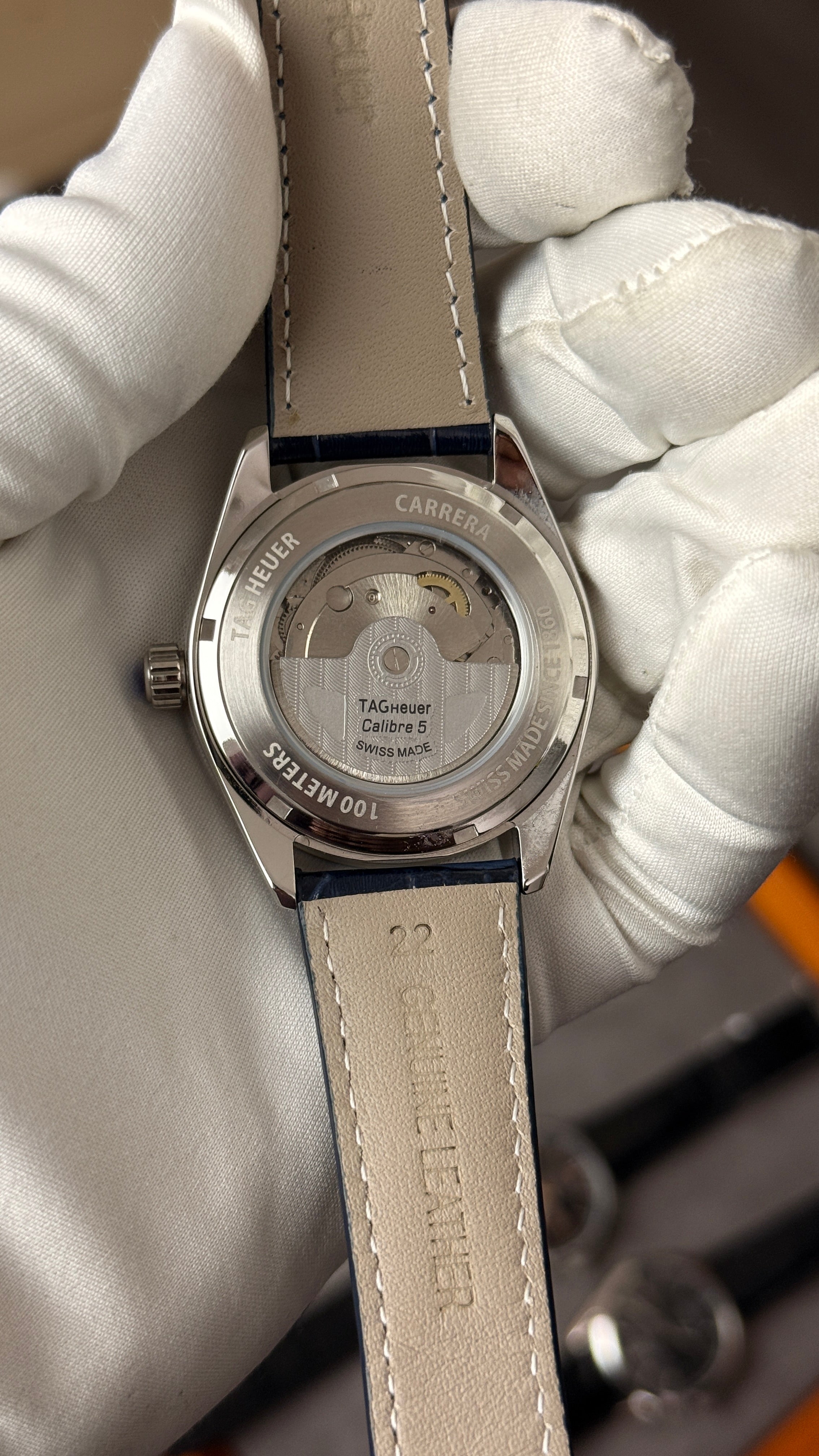 Silver with blue Dial