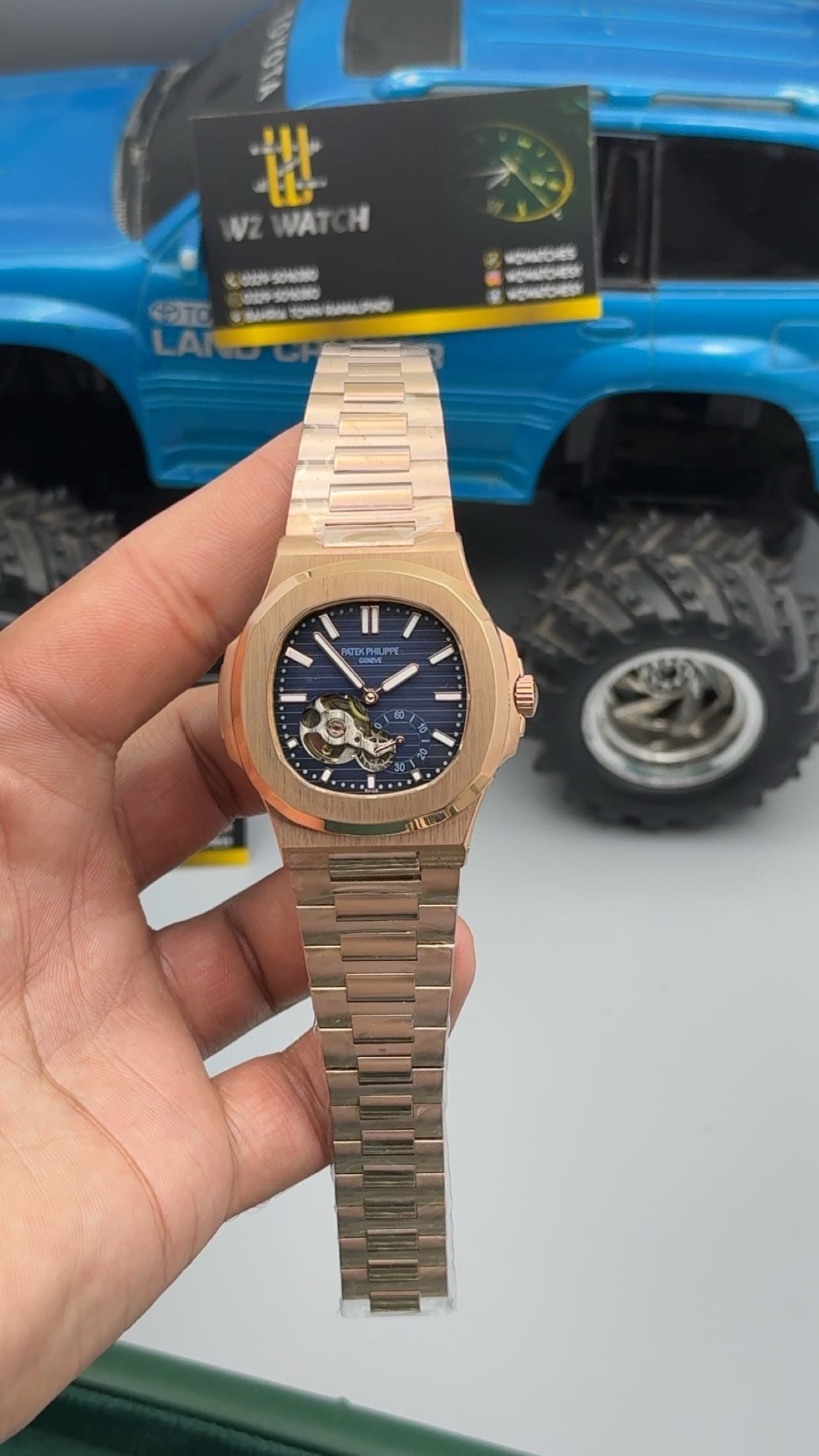 Rose gold with blue Dial.
