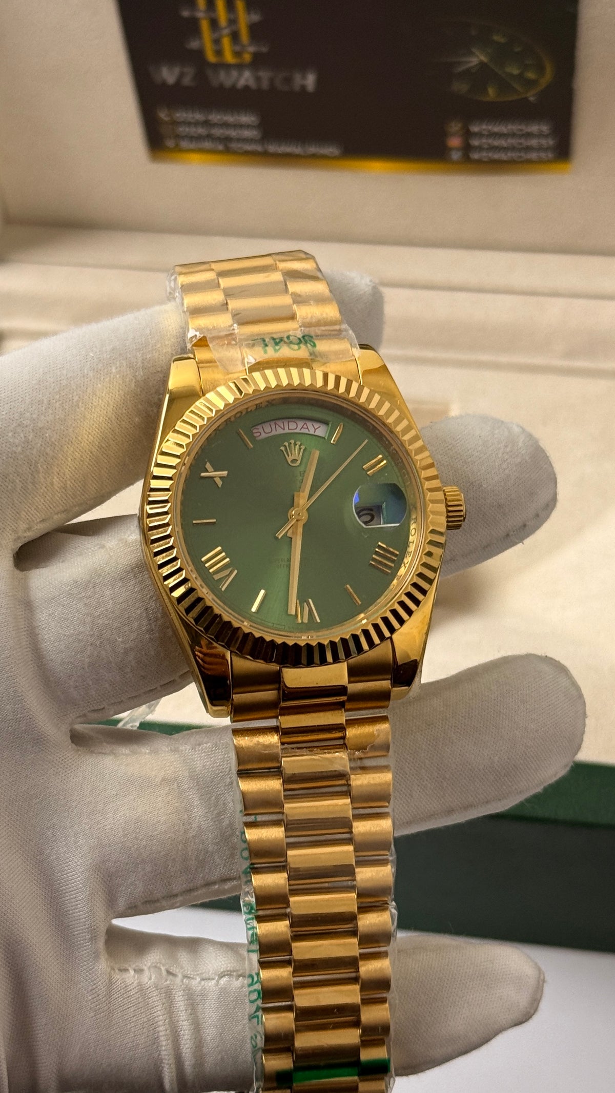 Yellow Gold with Olive Green Dial.