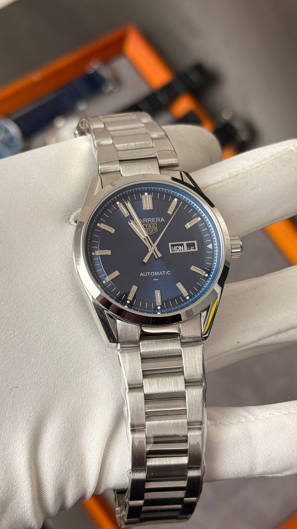 Silver with blue Dial