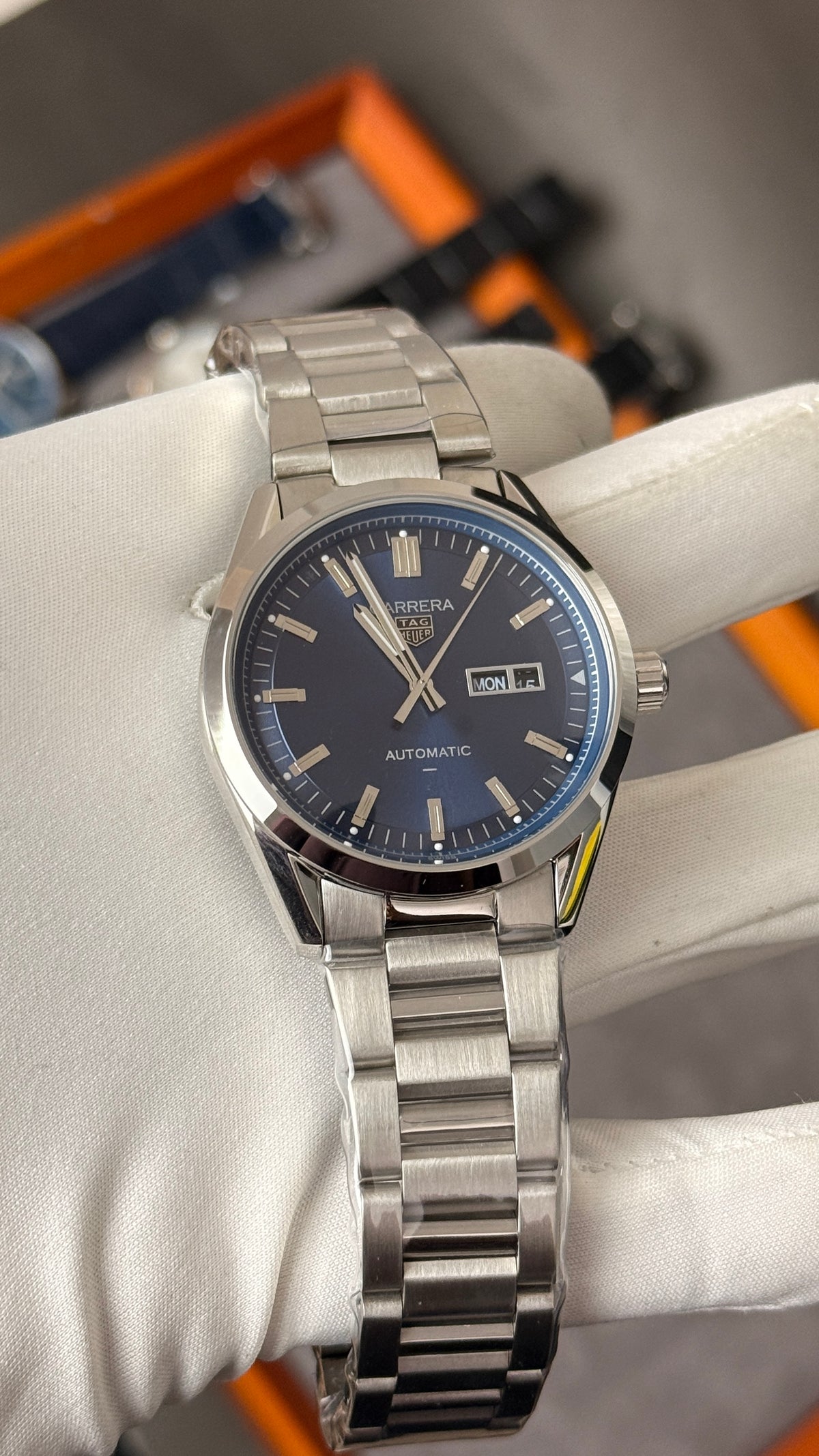 Silver with blue Dial