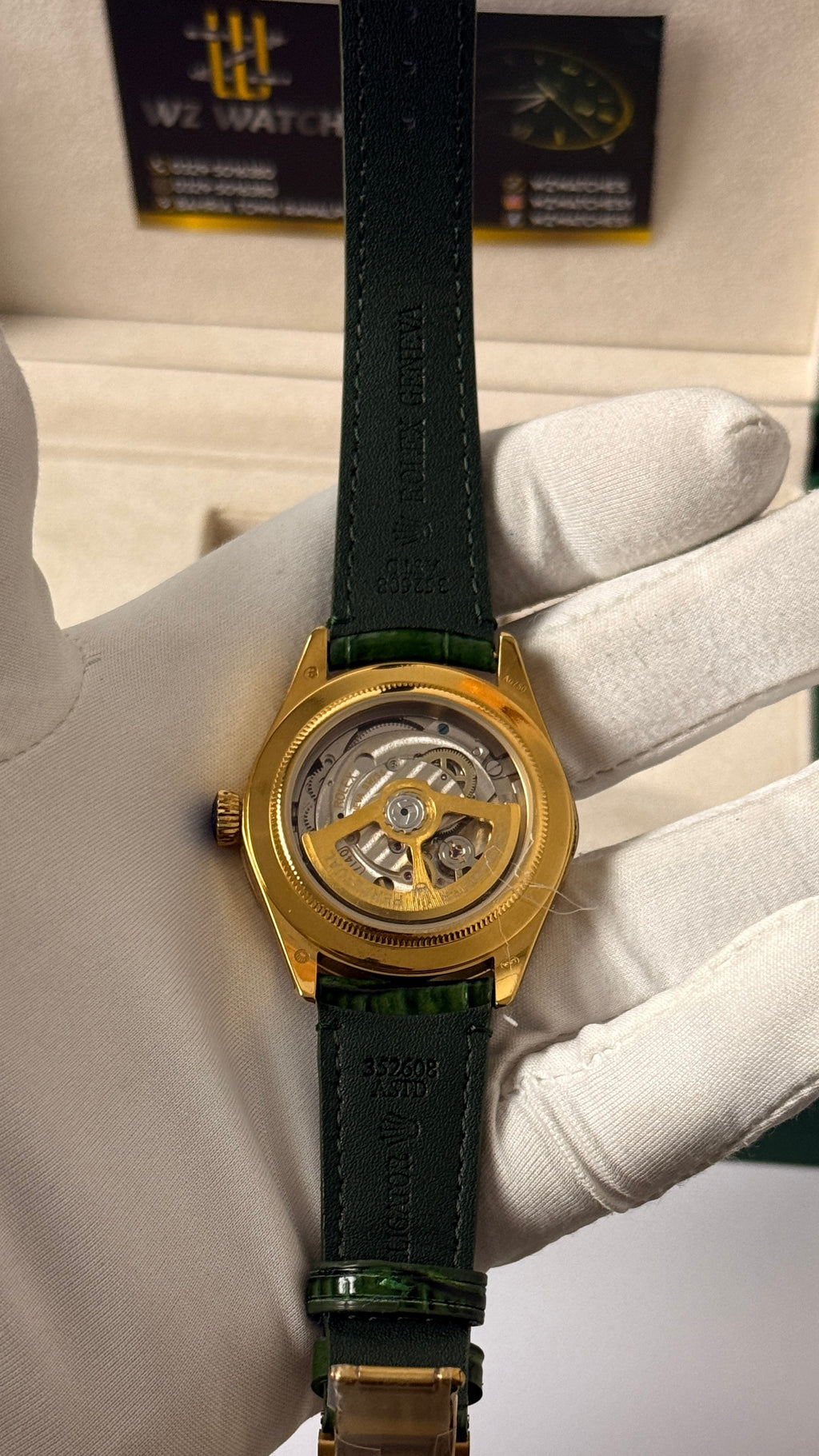 Yellow gold with green Dial
