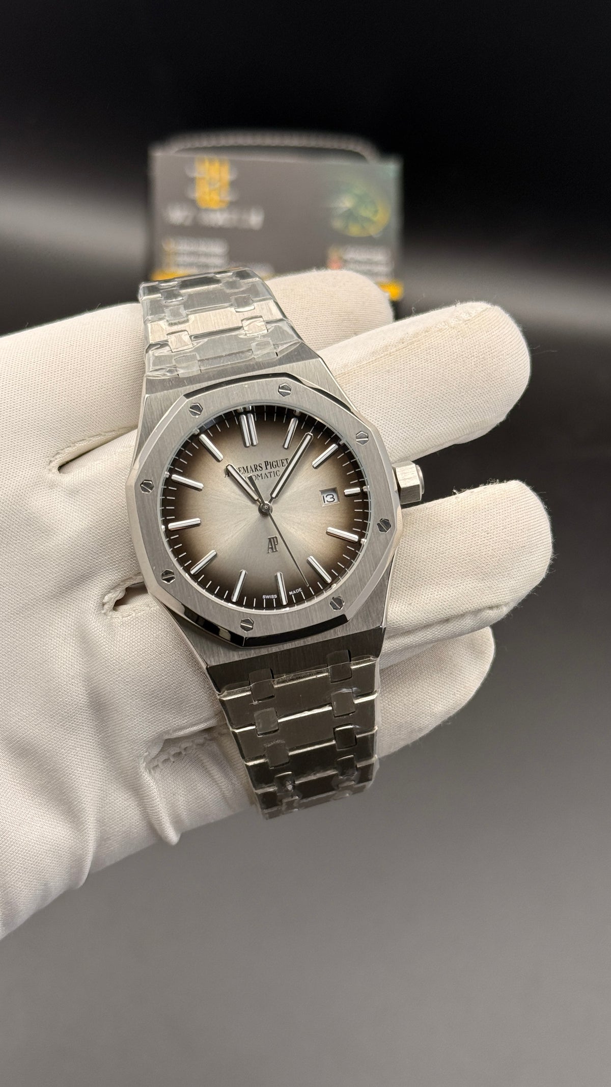 Silver with grey Dial.