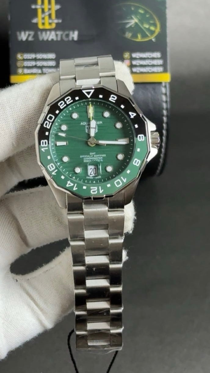 Silver with green Dial