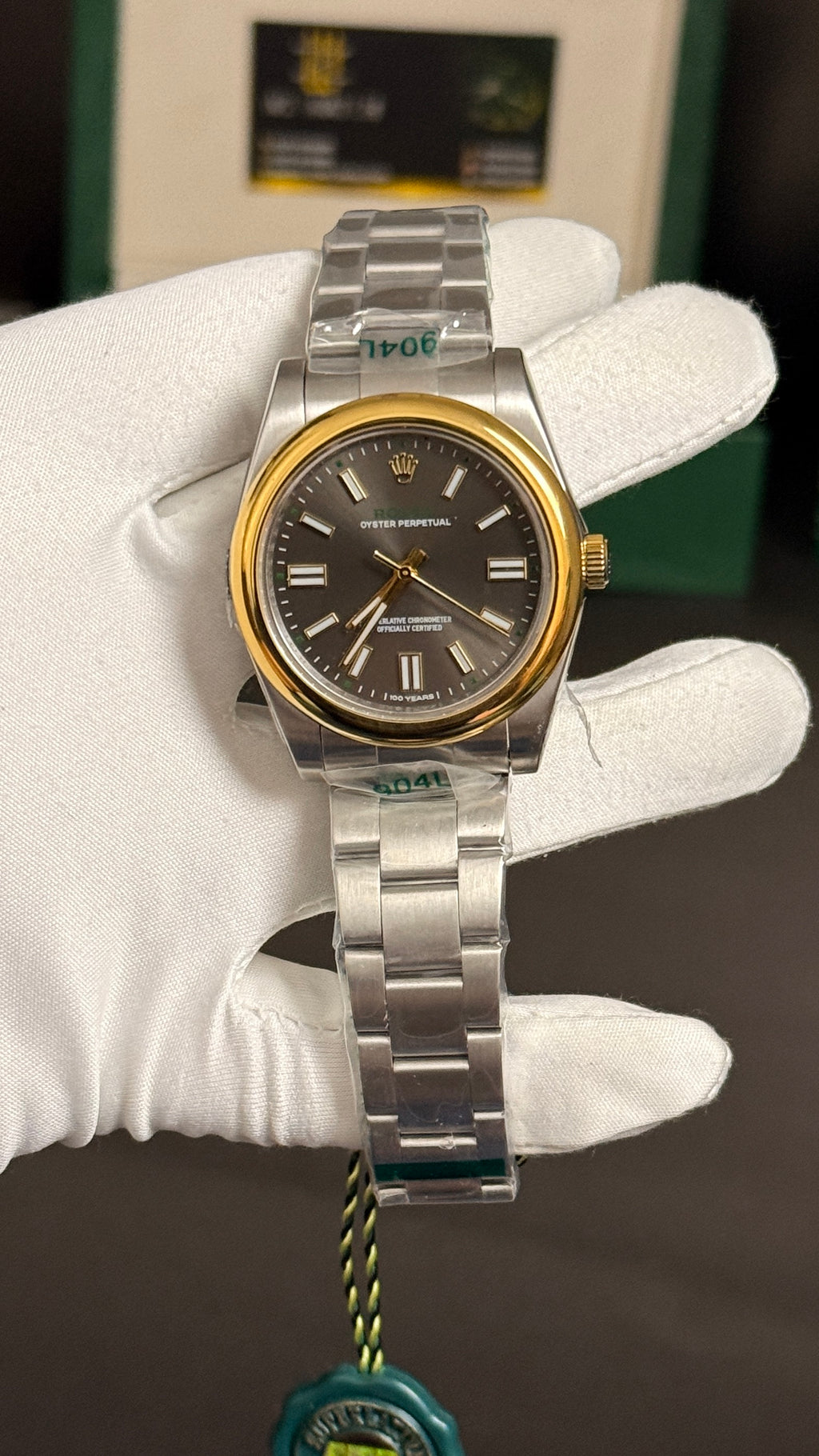 Yellow Gold two tone with gray Dial.