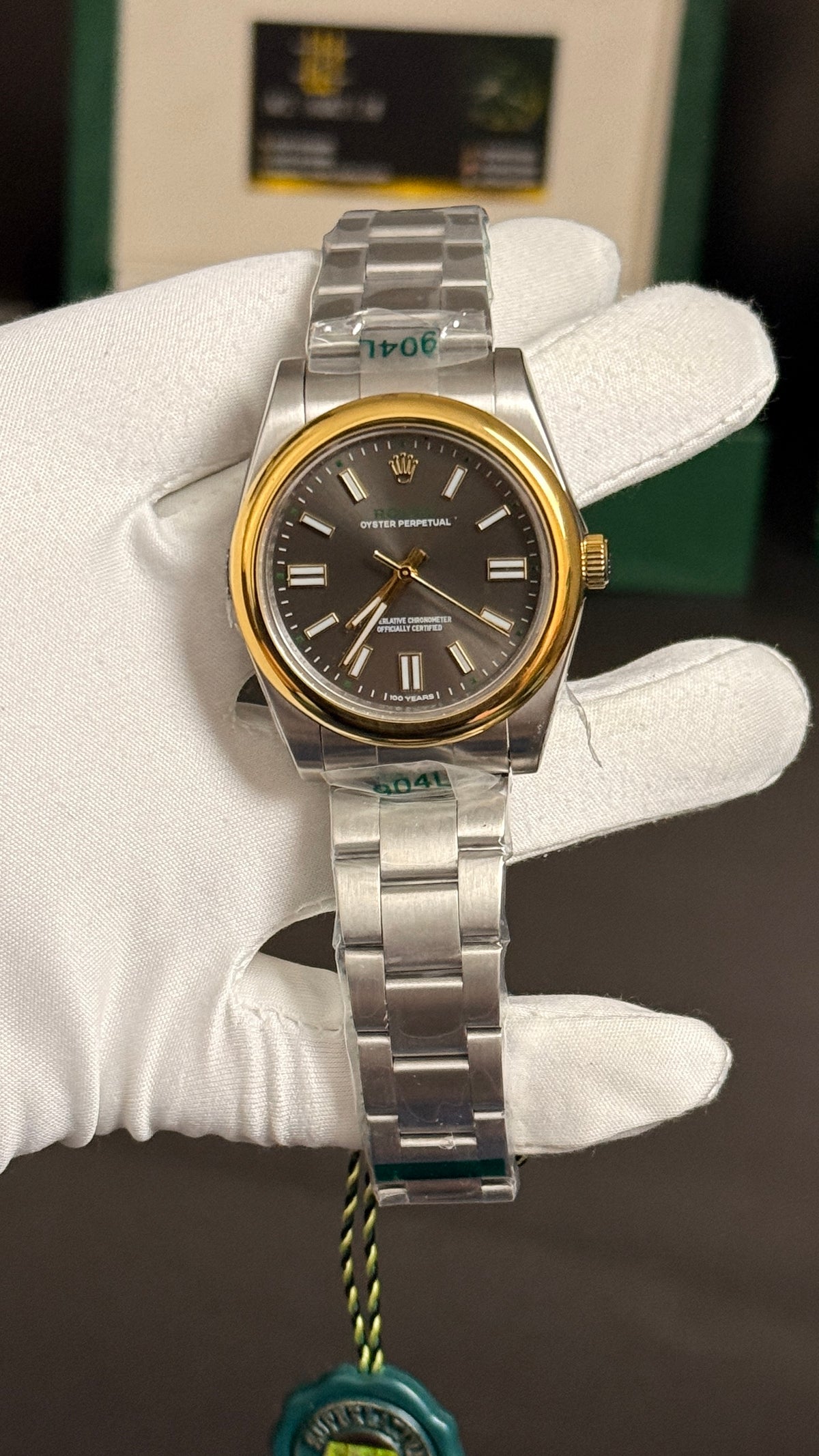 Yellow Gold two tone with gray Dial.