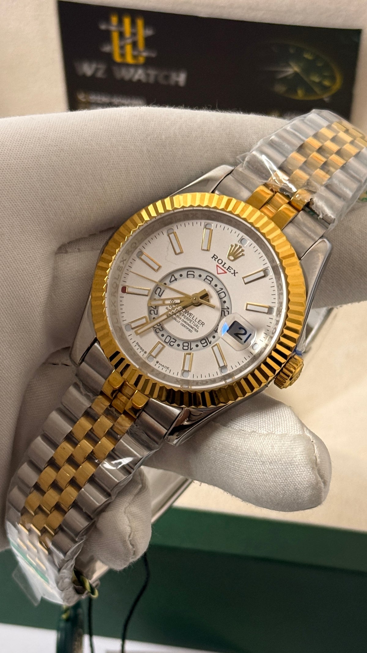 Yellow gold two tone with white Dial.