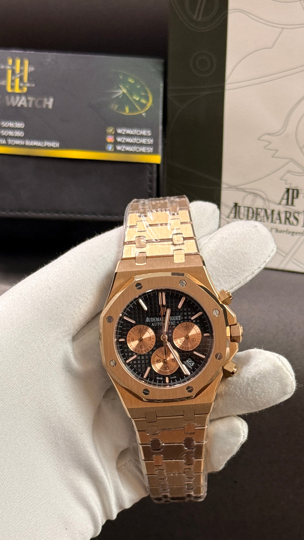 Rose gold with black dial
