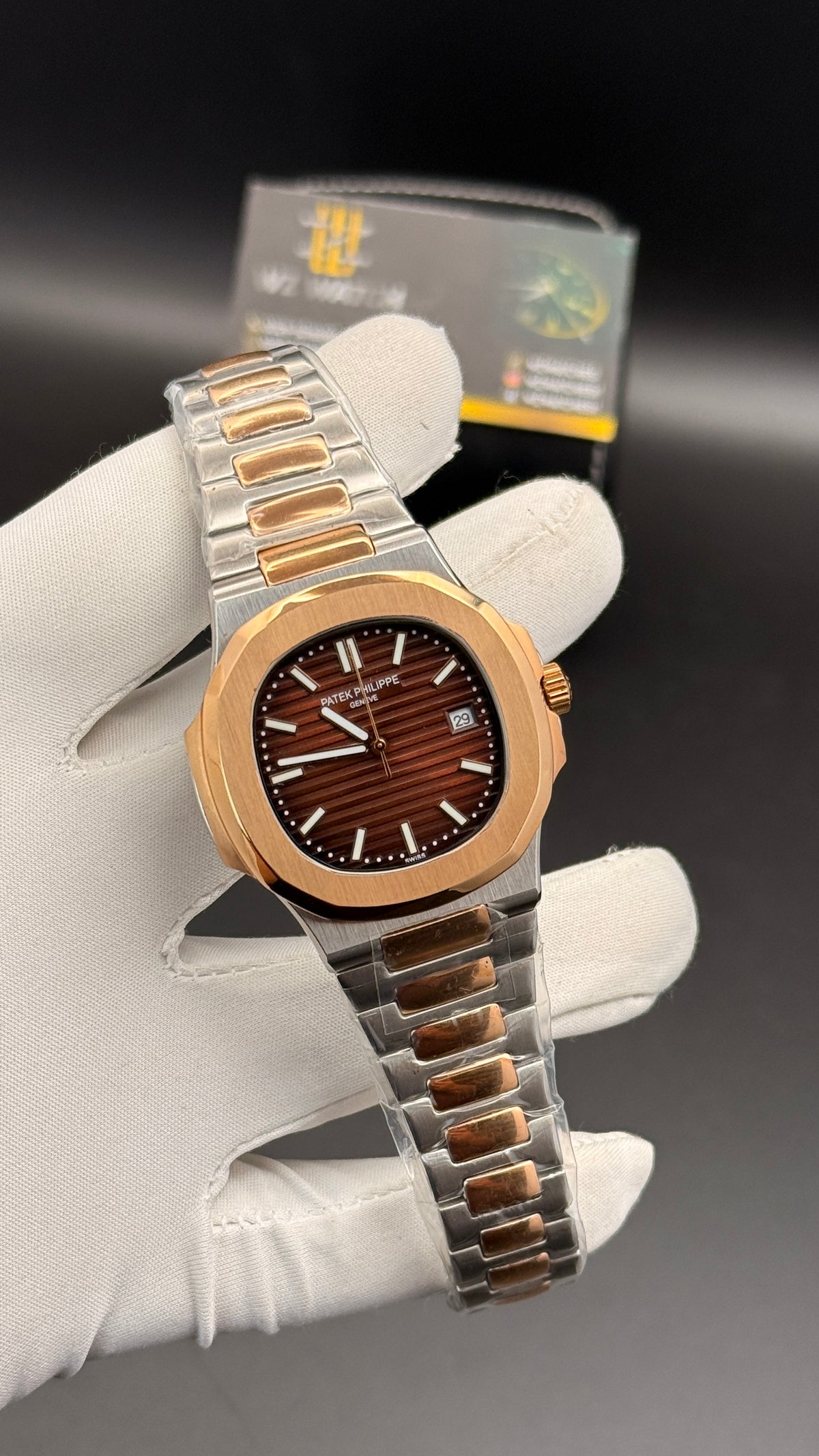 Rose gold two tone with chocolate Dial.