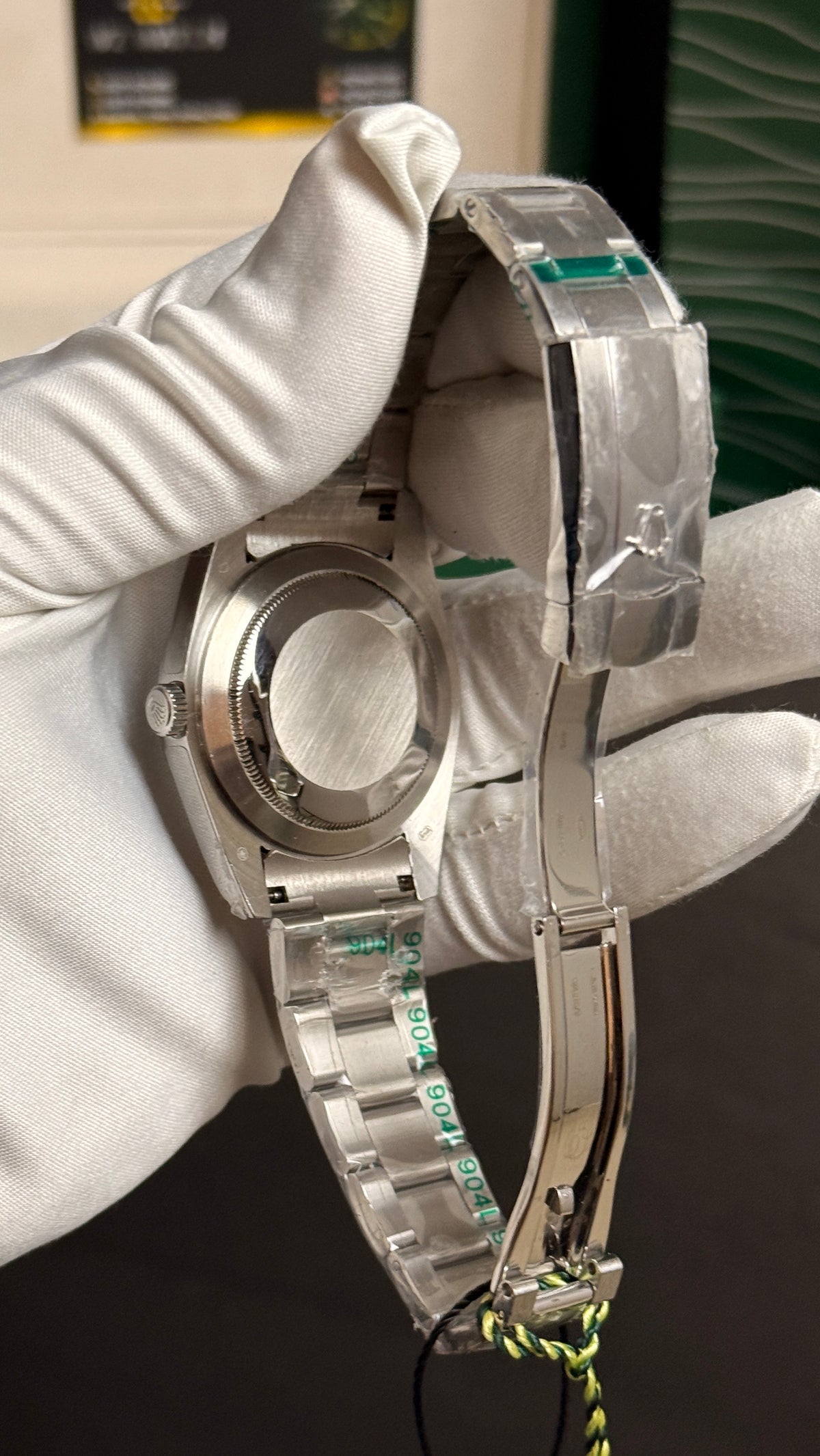 Silver with green Dial.