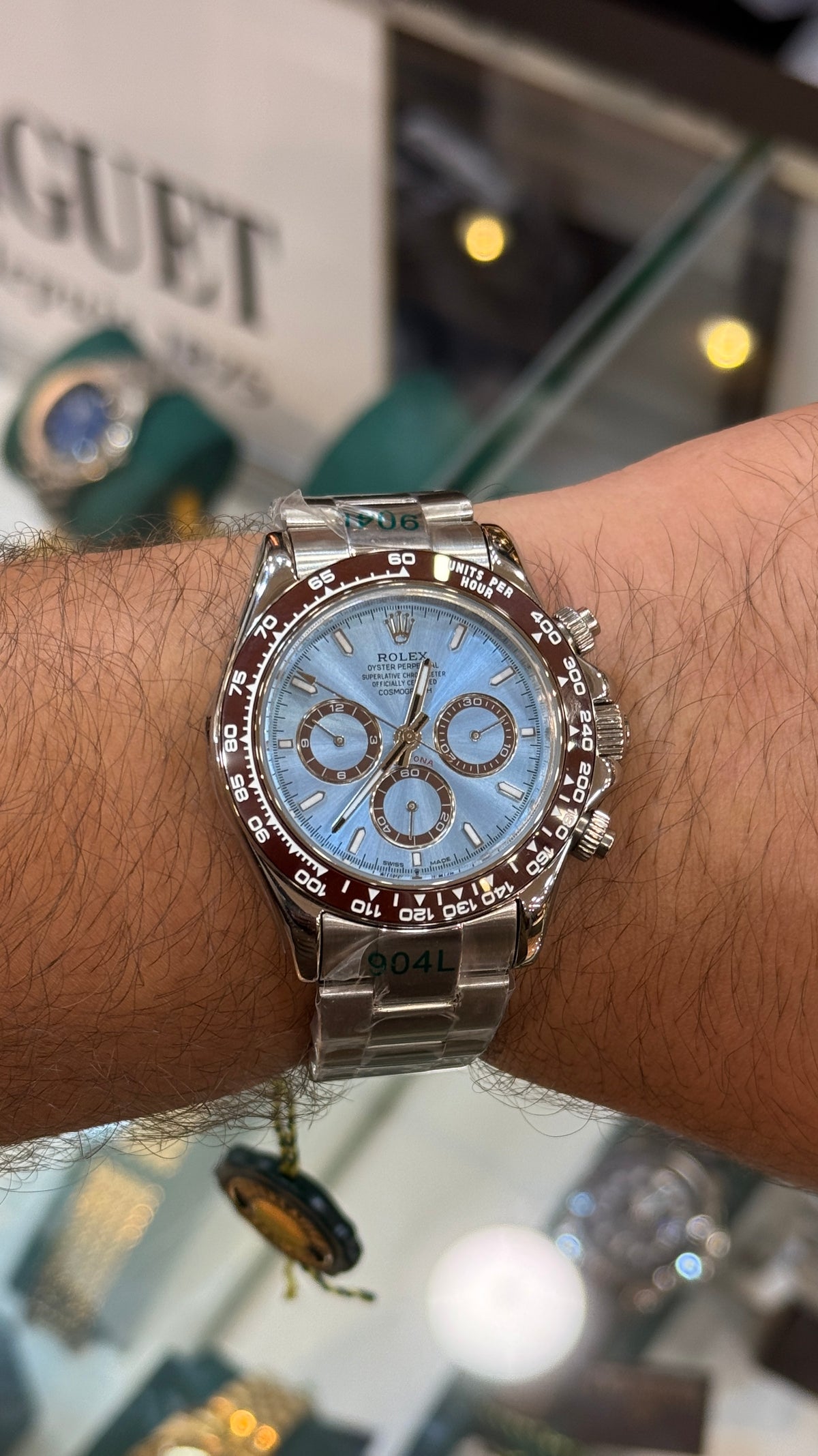 Silver with sky blue Dial.