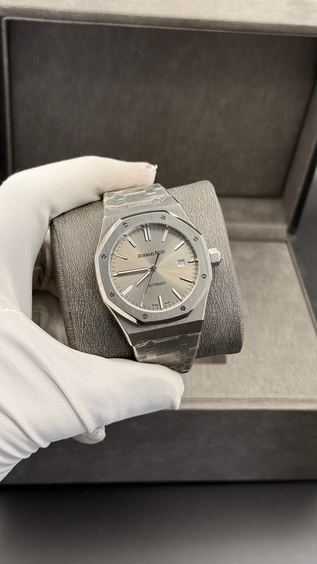 Silver with grey Dial.