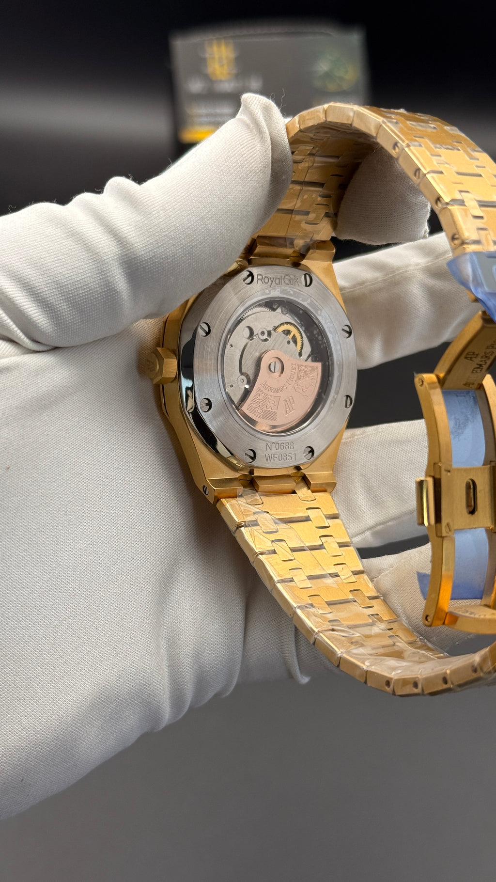 Yellow gold with black Dial.