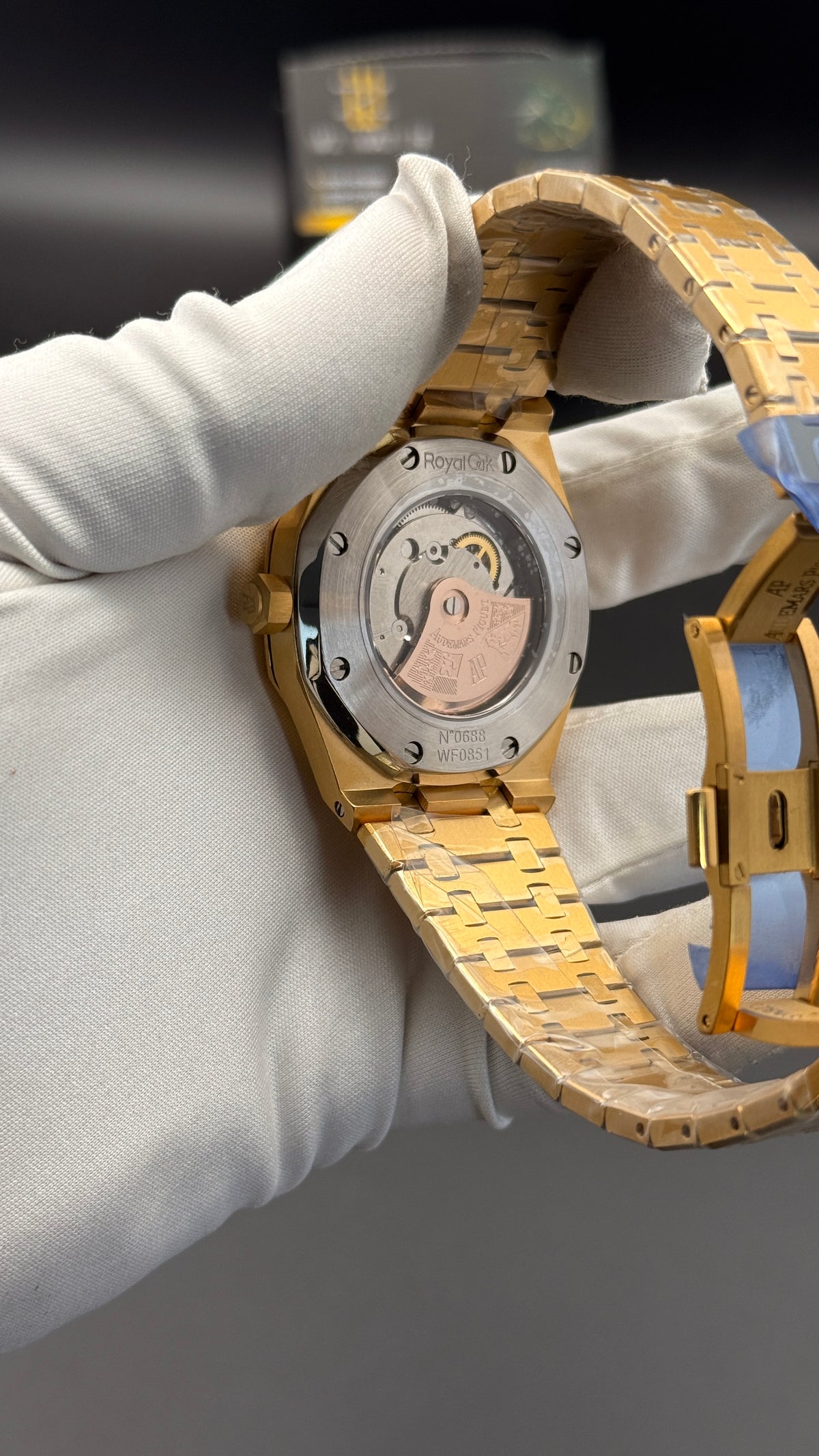 Yellow gold with black Dial.