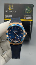 Rose Gold with Blue Dial.