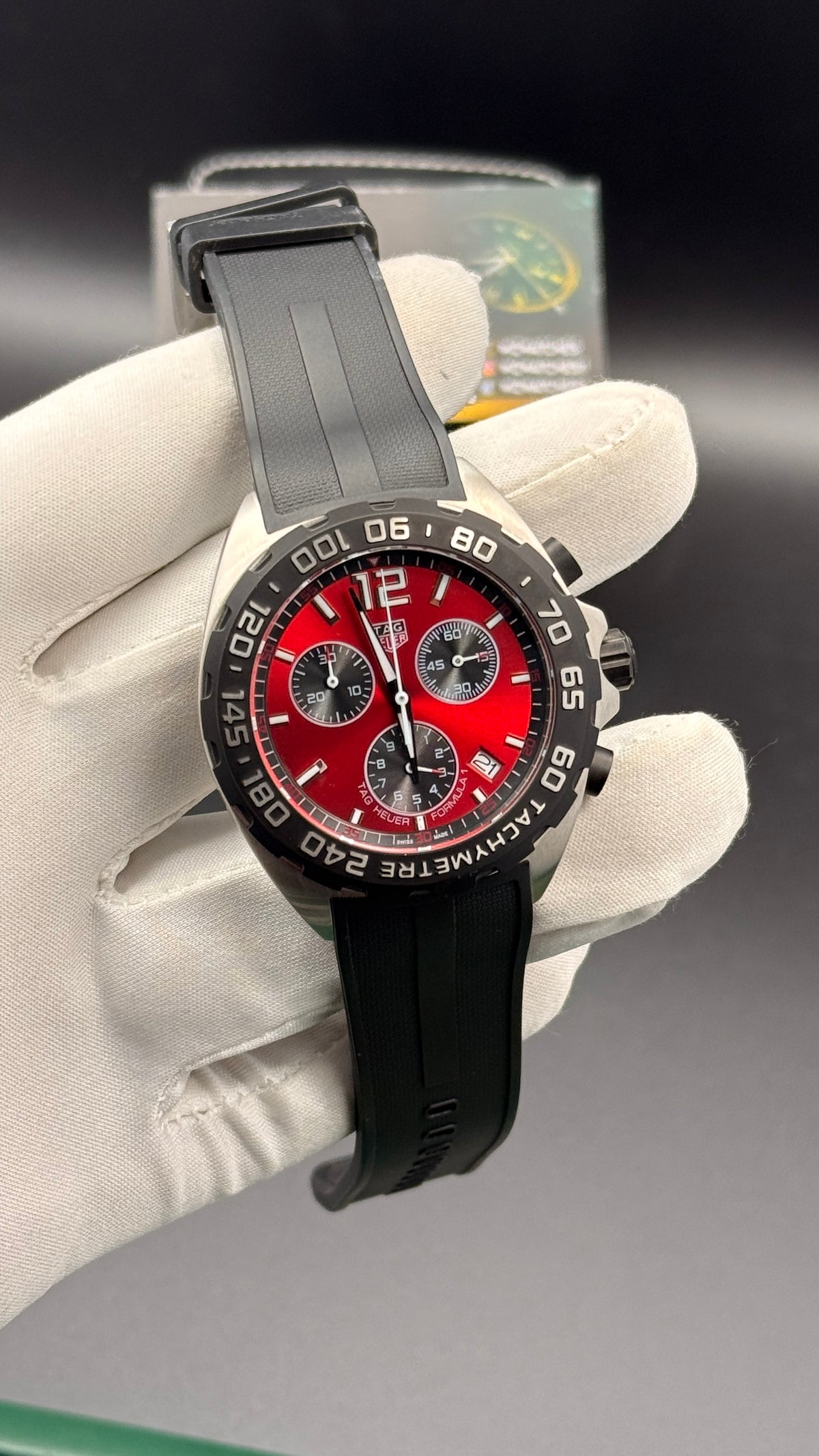 Silver with maroon Dial.