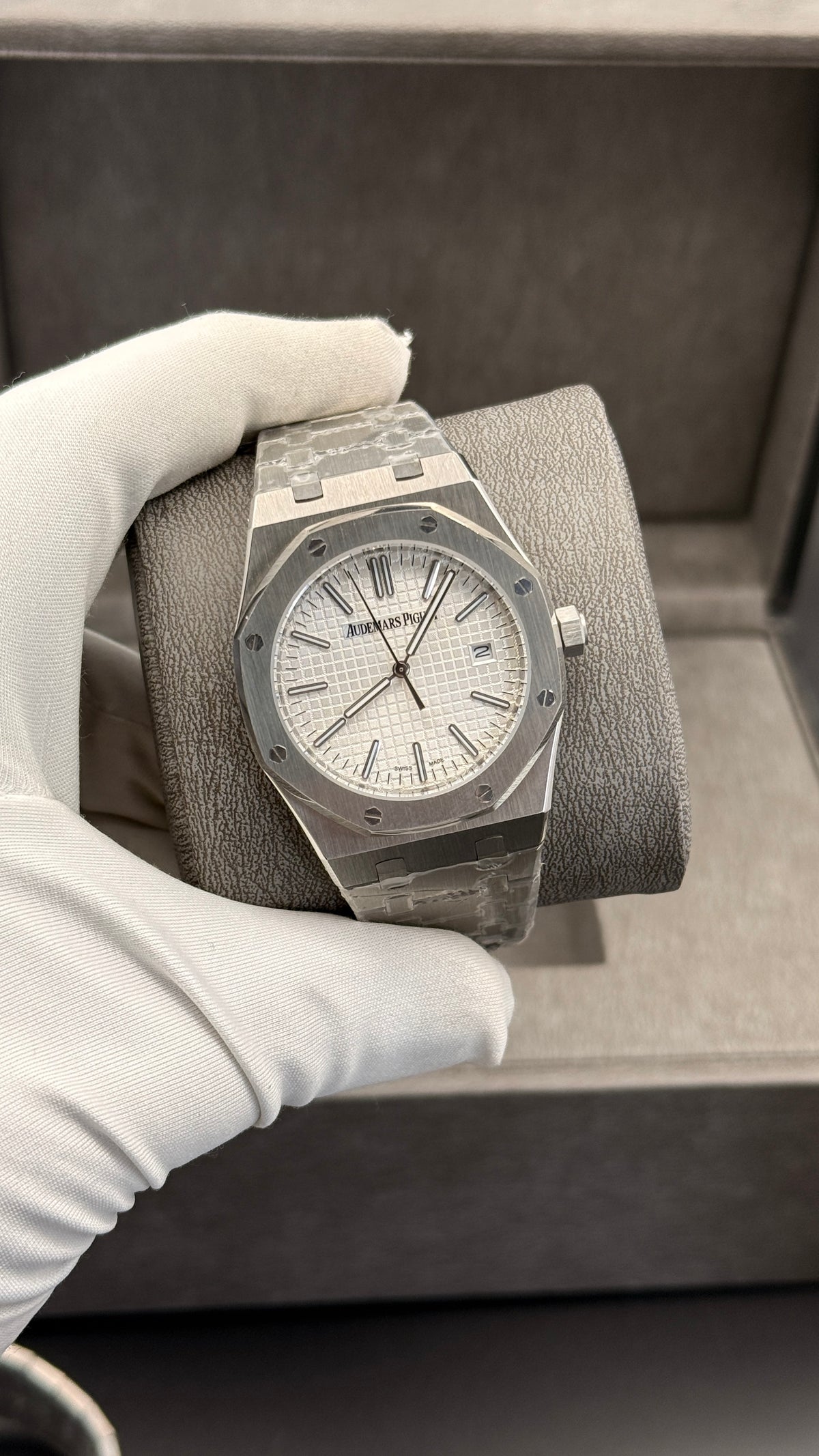 Silver with white Dial.