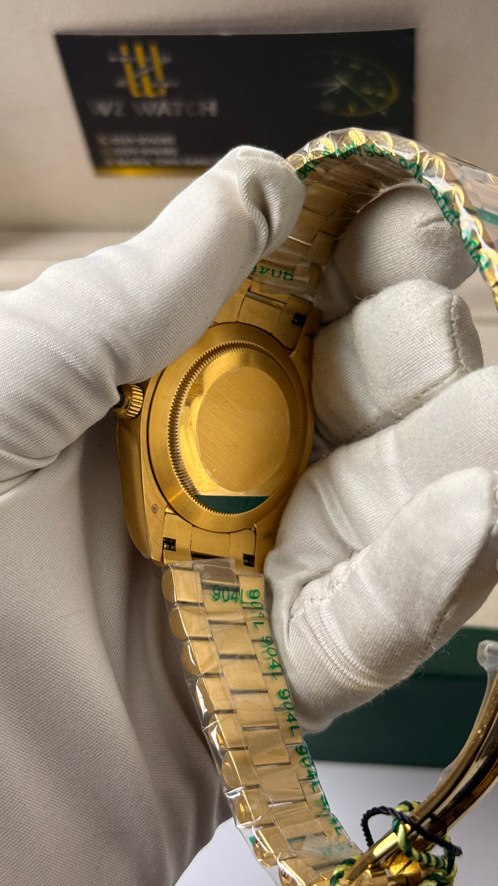 Yellow Gold with  Green Dial.