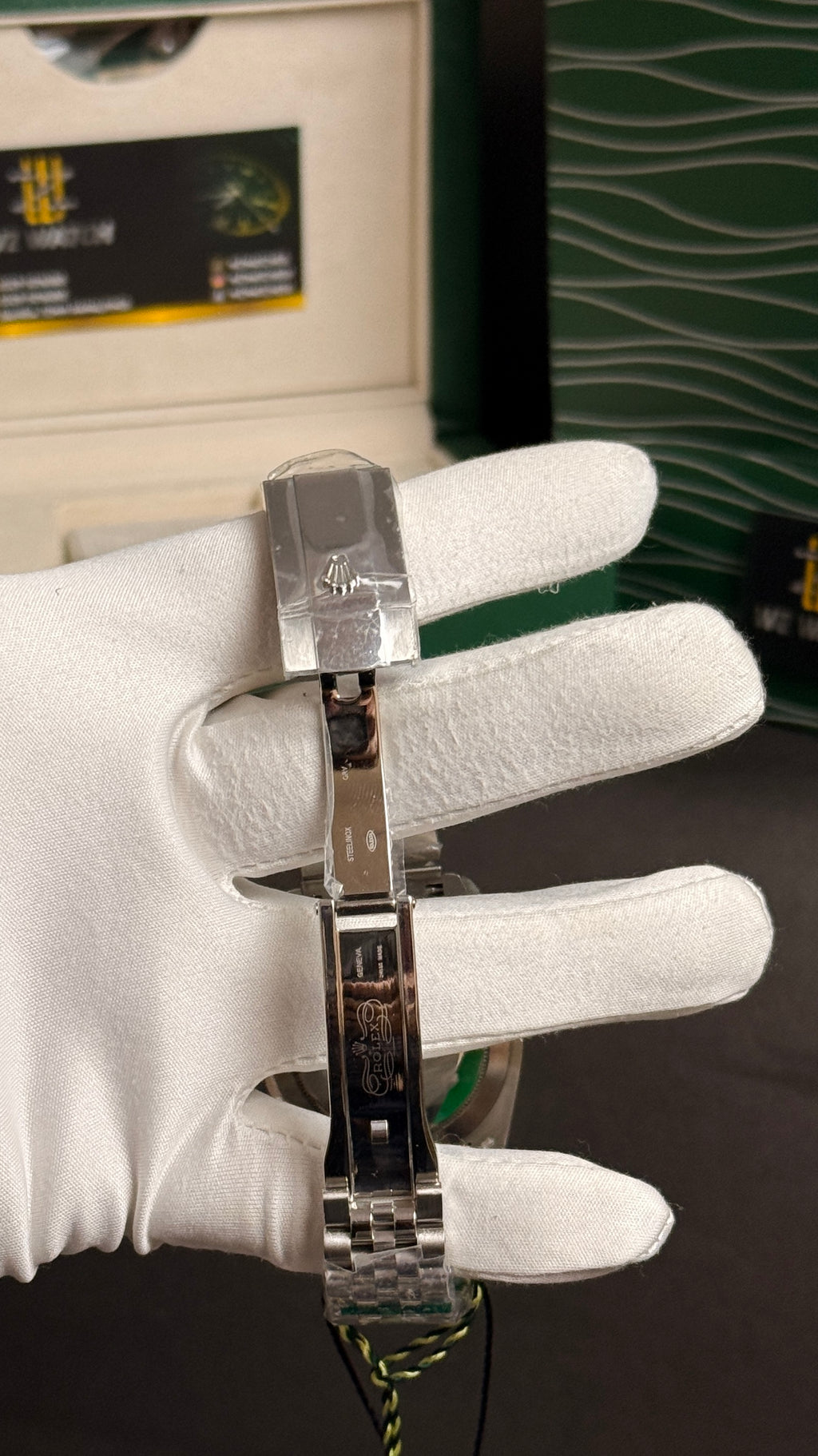 Silver with green Dial.