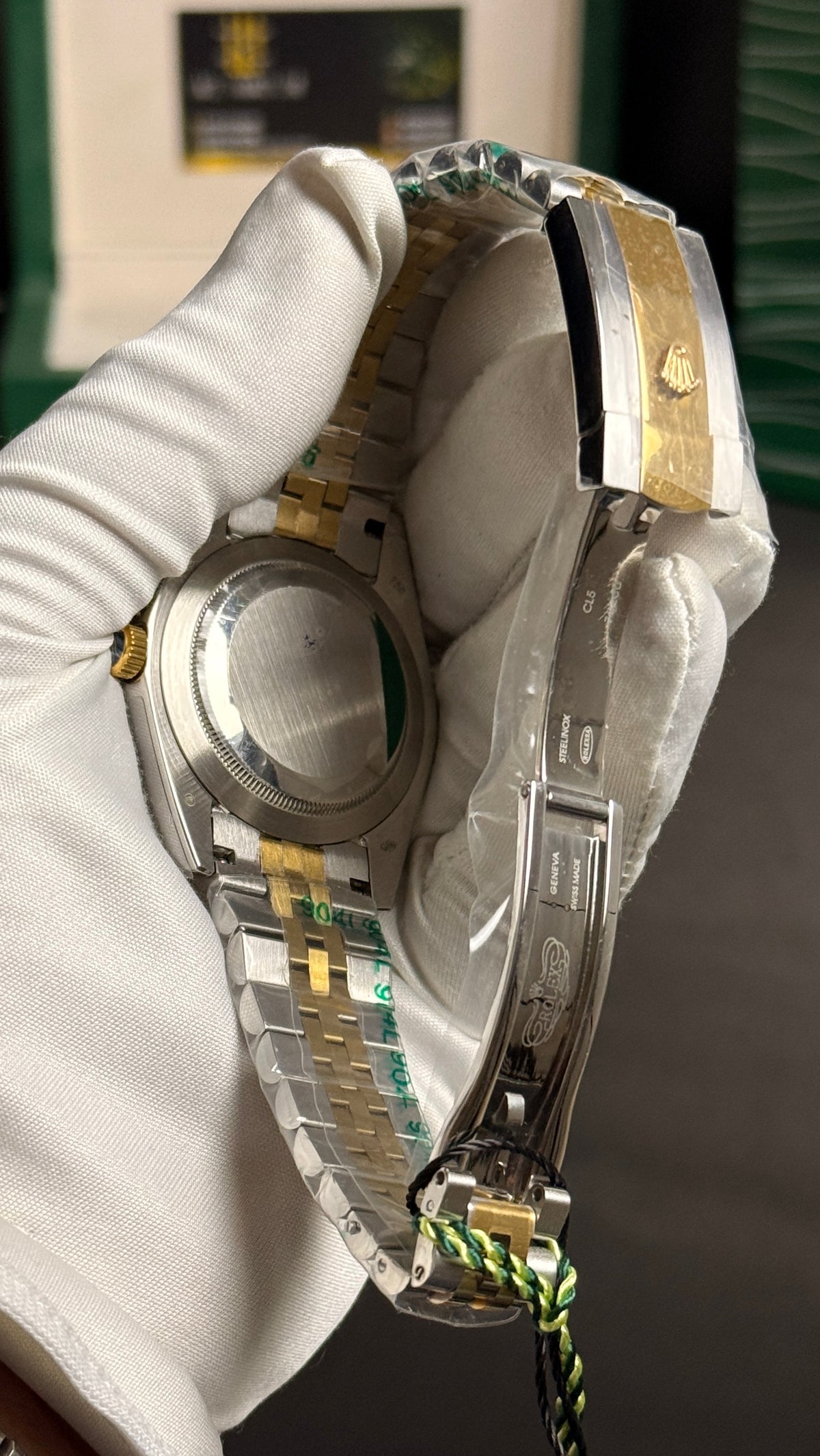 Yellow gold tow tone with grey Dial.