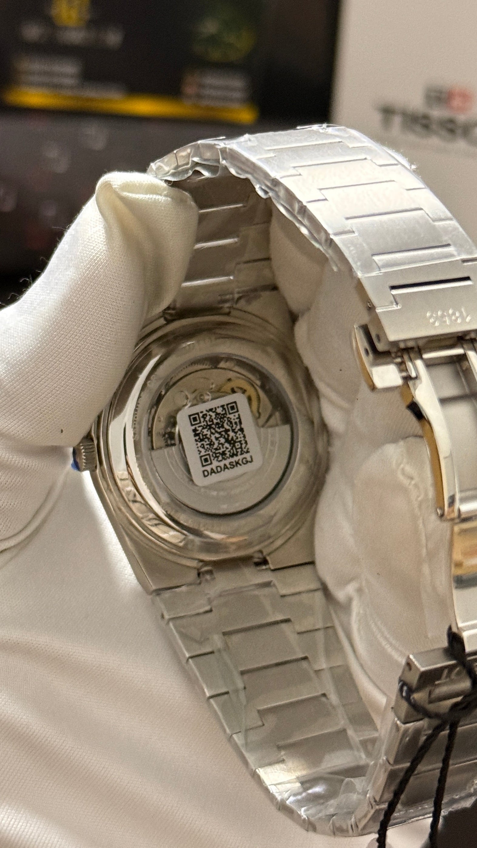 Silver with blue dial