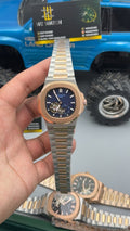 Rose gold two tone with blue Dial.