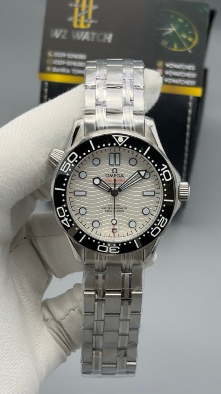 Silver with white  Dial.