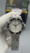 Silver with white  Dial.