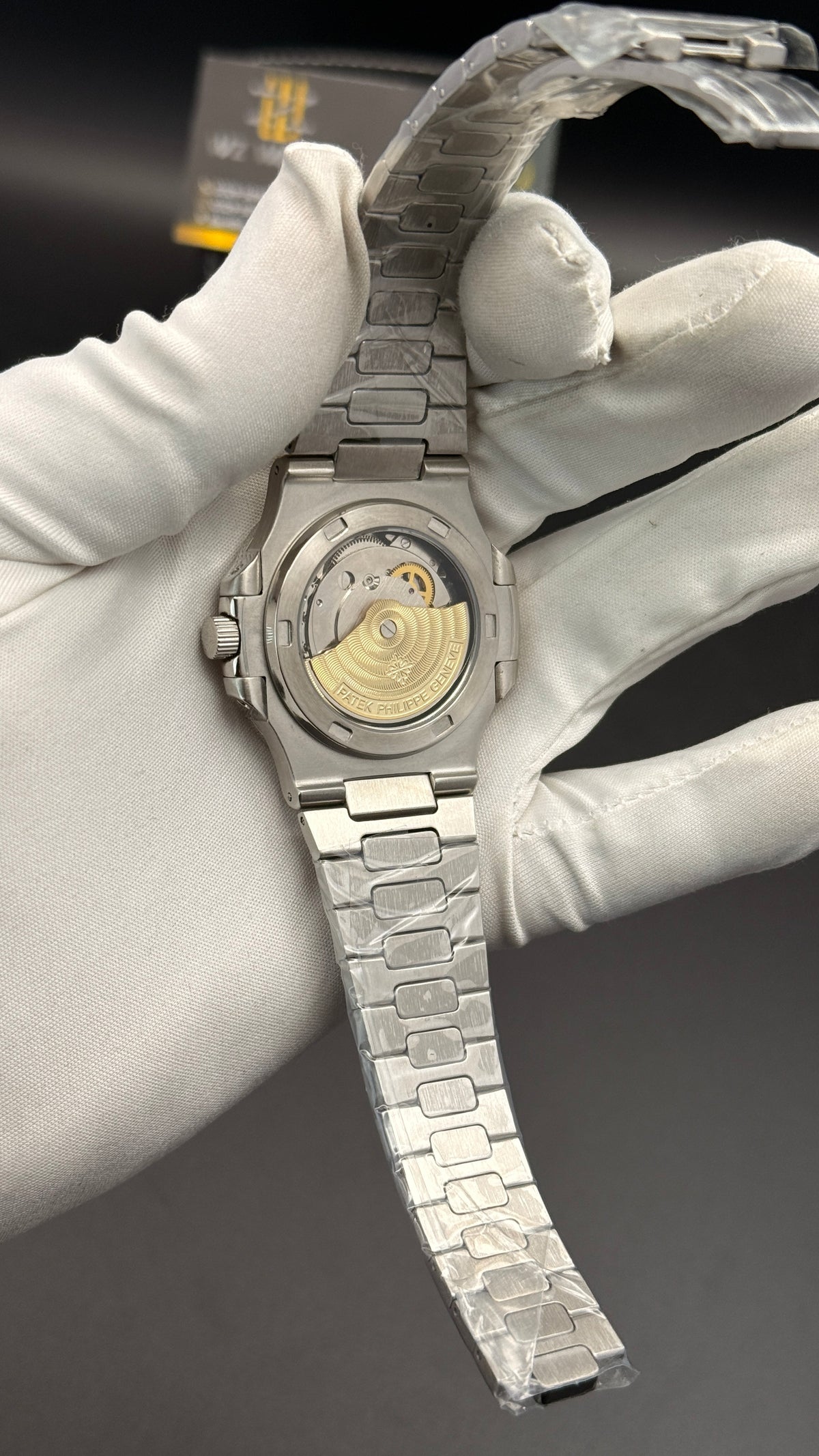 Silver with grey Dial.