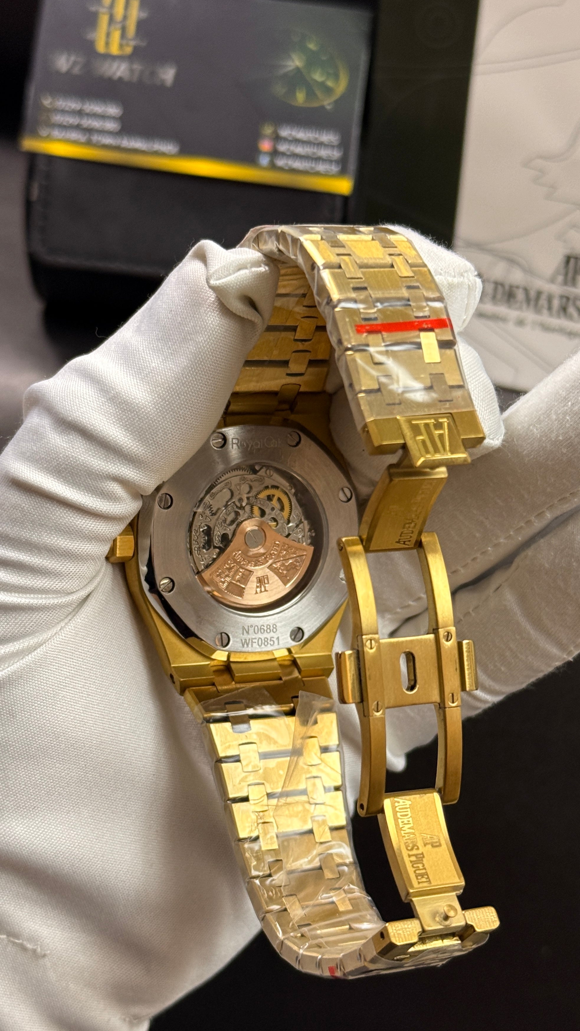Yellow gold with blue skeleton dial