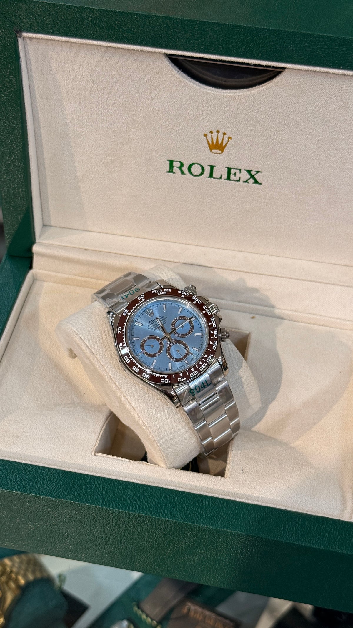 Silver with sky blue Dial.