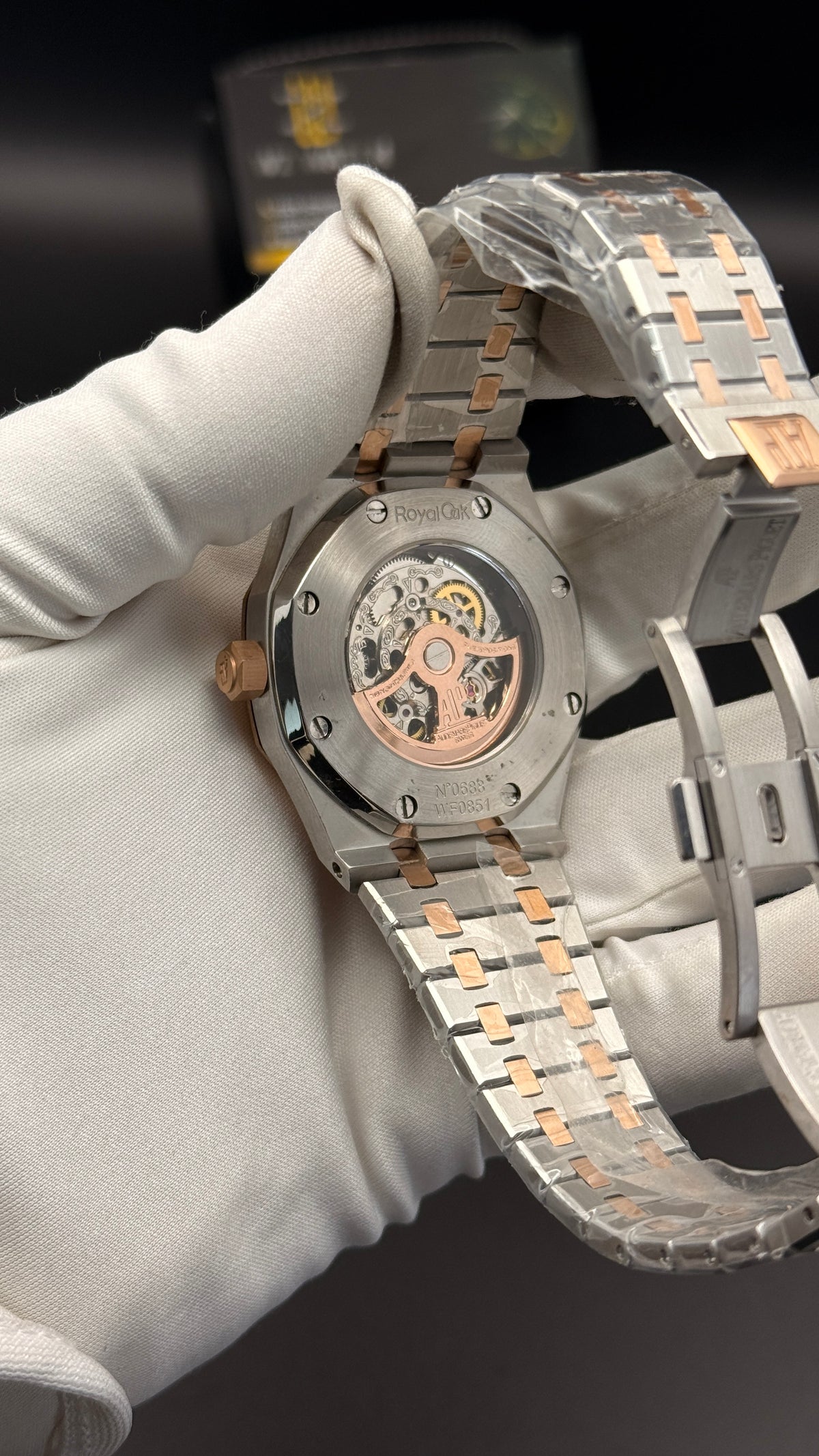Rose gold two tone with blue skeleton Dial.