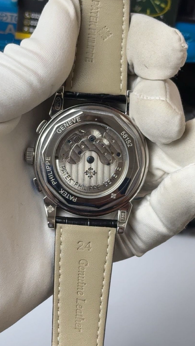 Silver with blue Dial.