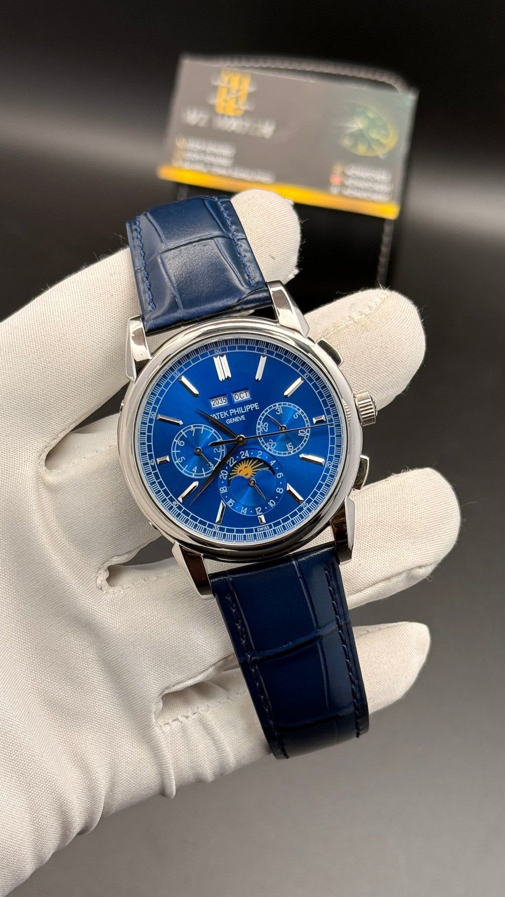 Silver with blue Dial.