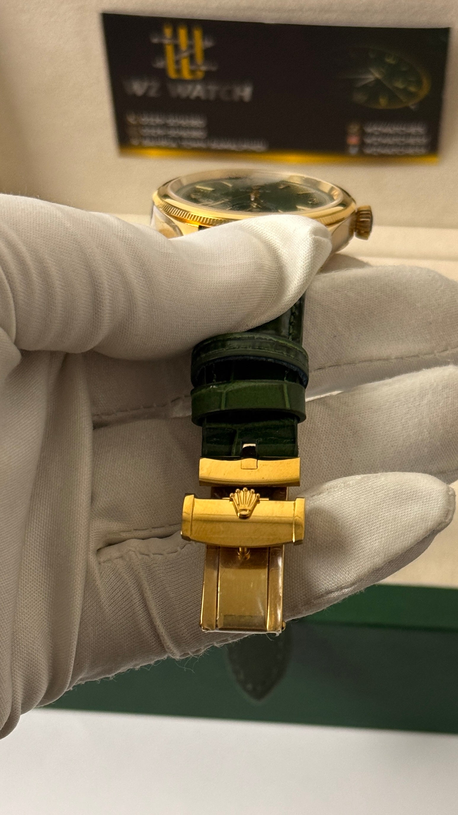 Yellow gold with green Dial